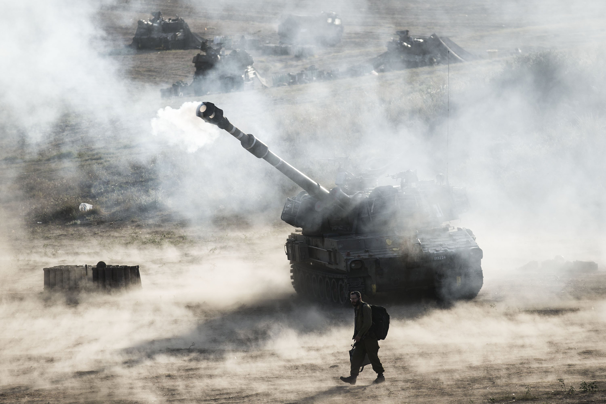 Israeli artillery smoke can be seen on July 14, 2014 at the Israeli-Gaza border.