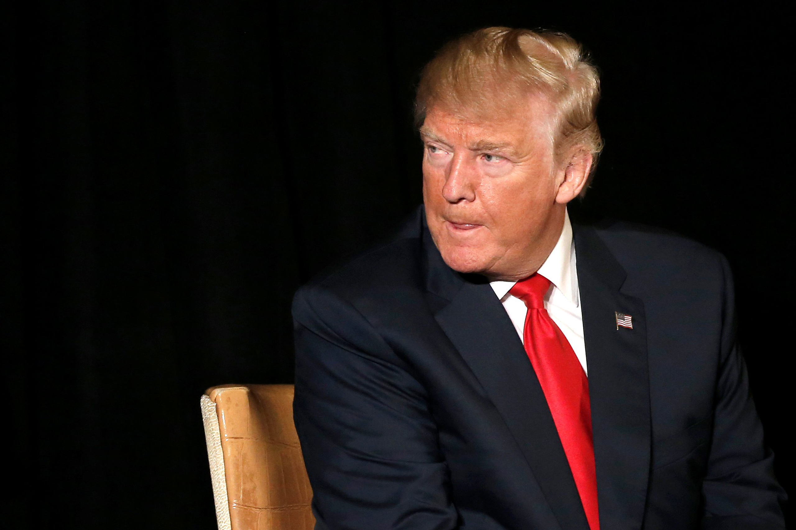 Donald Trump listens to a question as he appears at the "Retired American Warriors" conference in Herndon, Virginia on Oct. 3, 2016.