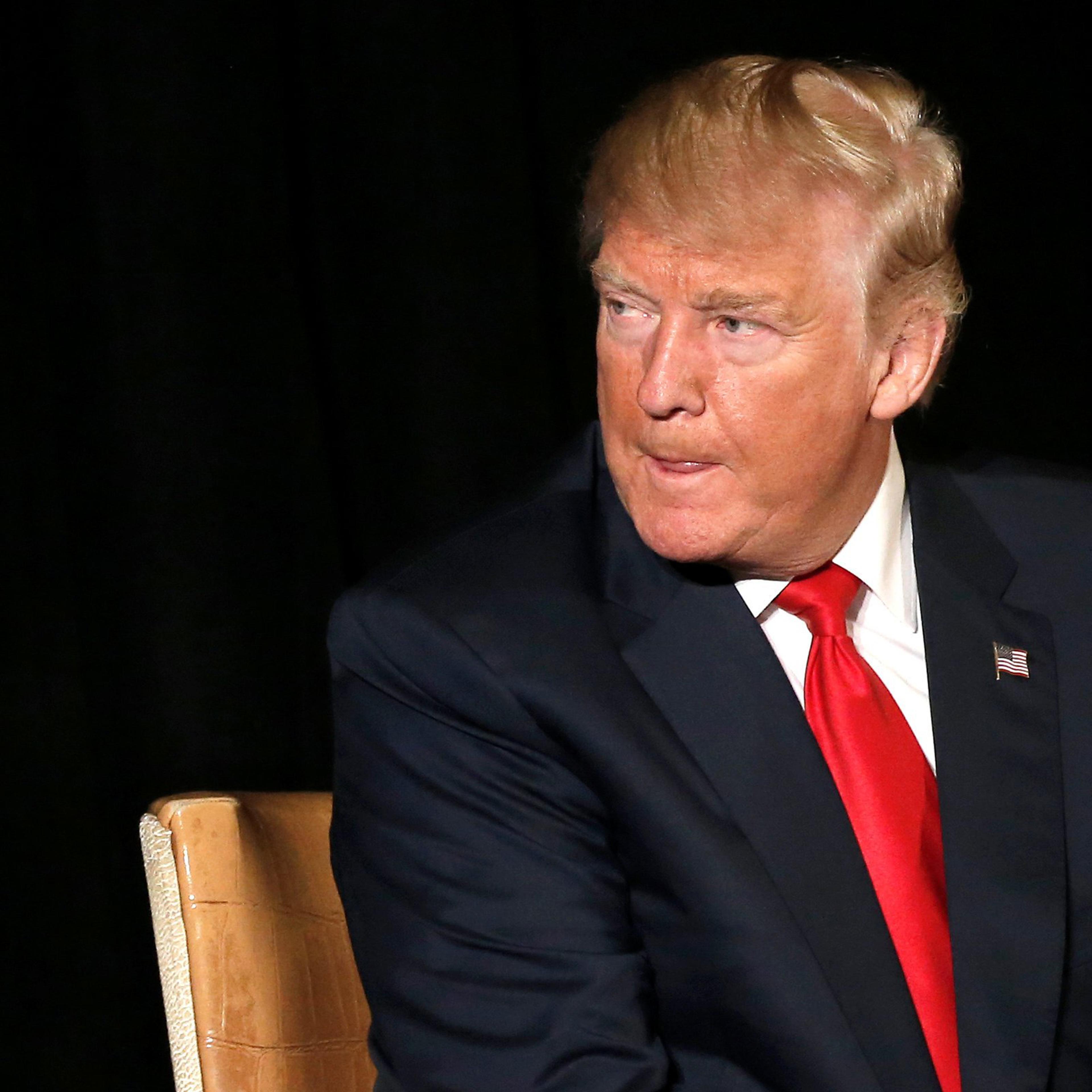 Donald Trump listens to a question as he appears at the "Retired American Warriors" conference in Herndon, Virginia on Oct. 3, 2016.