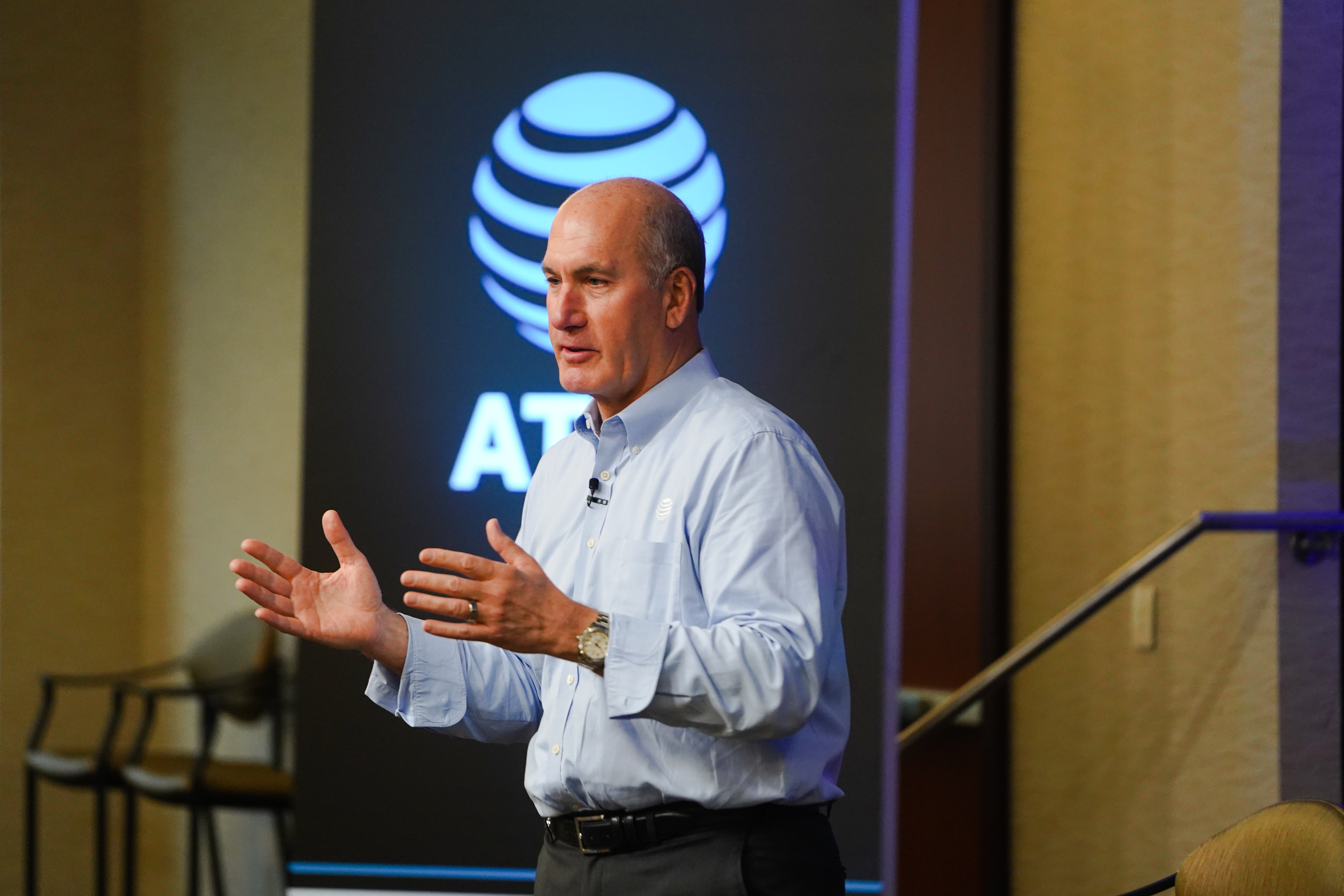 John Stankey, CEO of AT&T, speaks with employees in Atlanta in June 2022.