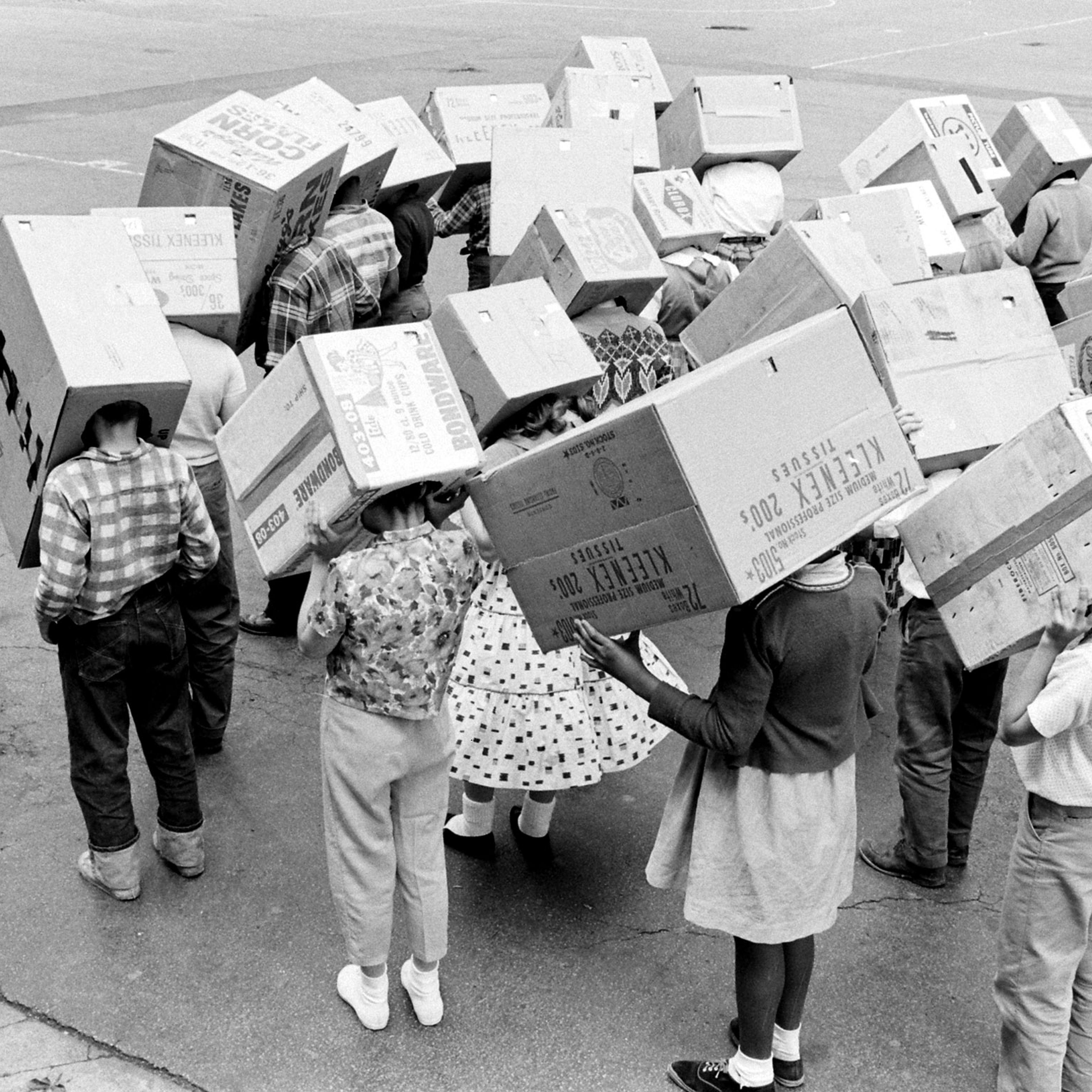 Children demonstrate how to watch a solar eclipse in 1963