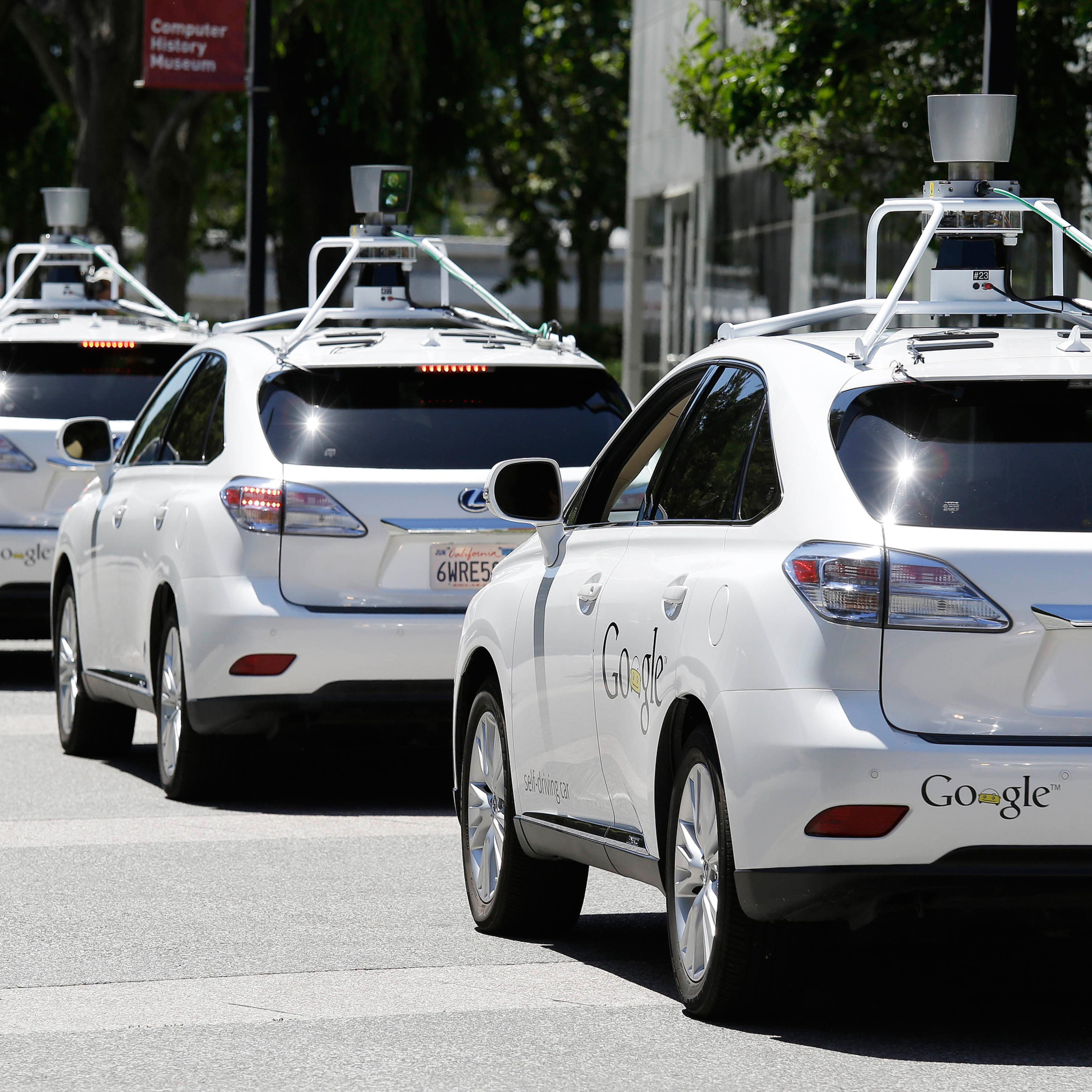 A row of Google self-driving cars in Mountain View, California