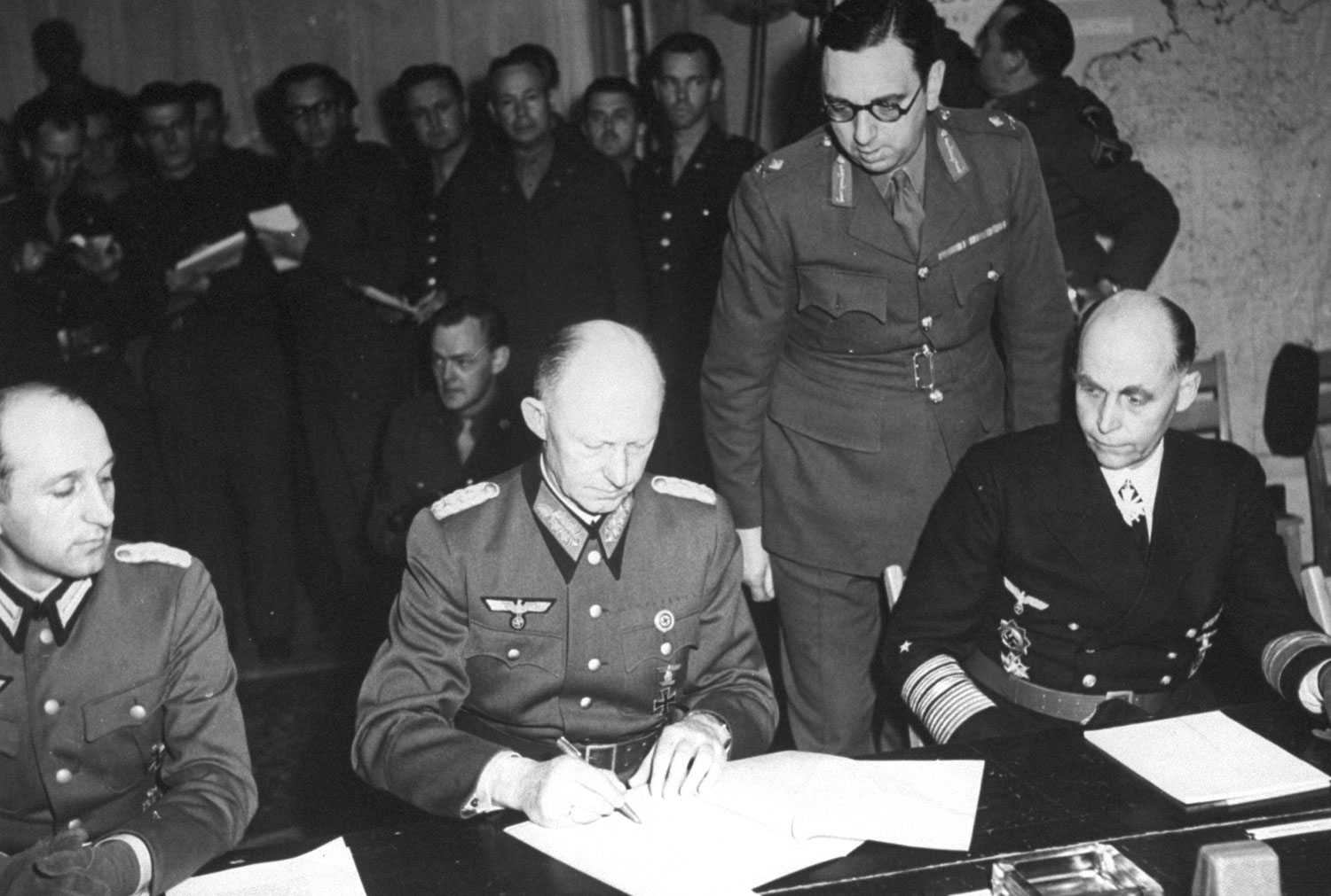 German Col. General Alfred Jodl signs the Instrument of Surrender at Reims, France, May 7, 1945.