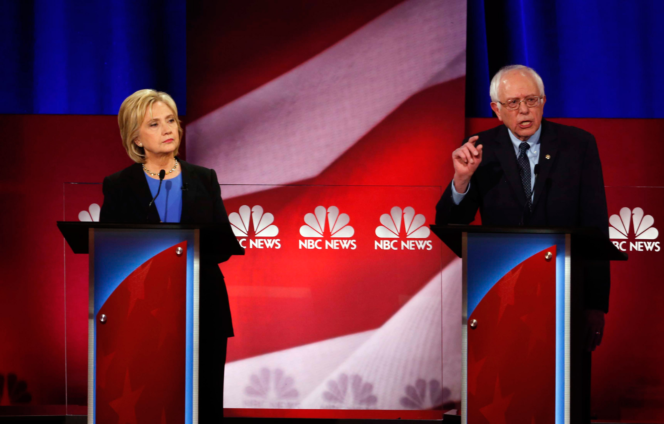 Democratic presidential candidate, Sen. Bernie Sanders, I-Vt, right, speaks, as Democratic presidential candidate, Hillary Clinton listens, at the NBC, YouTube Democratic presidential debate at the Gaillard Center, Sunday, Jan. 17, 2016, in Charleston, S