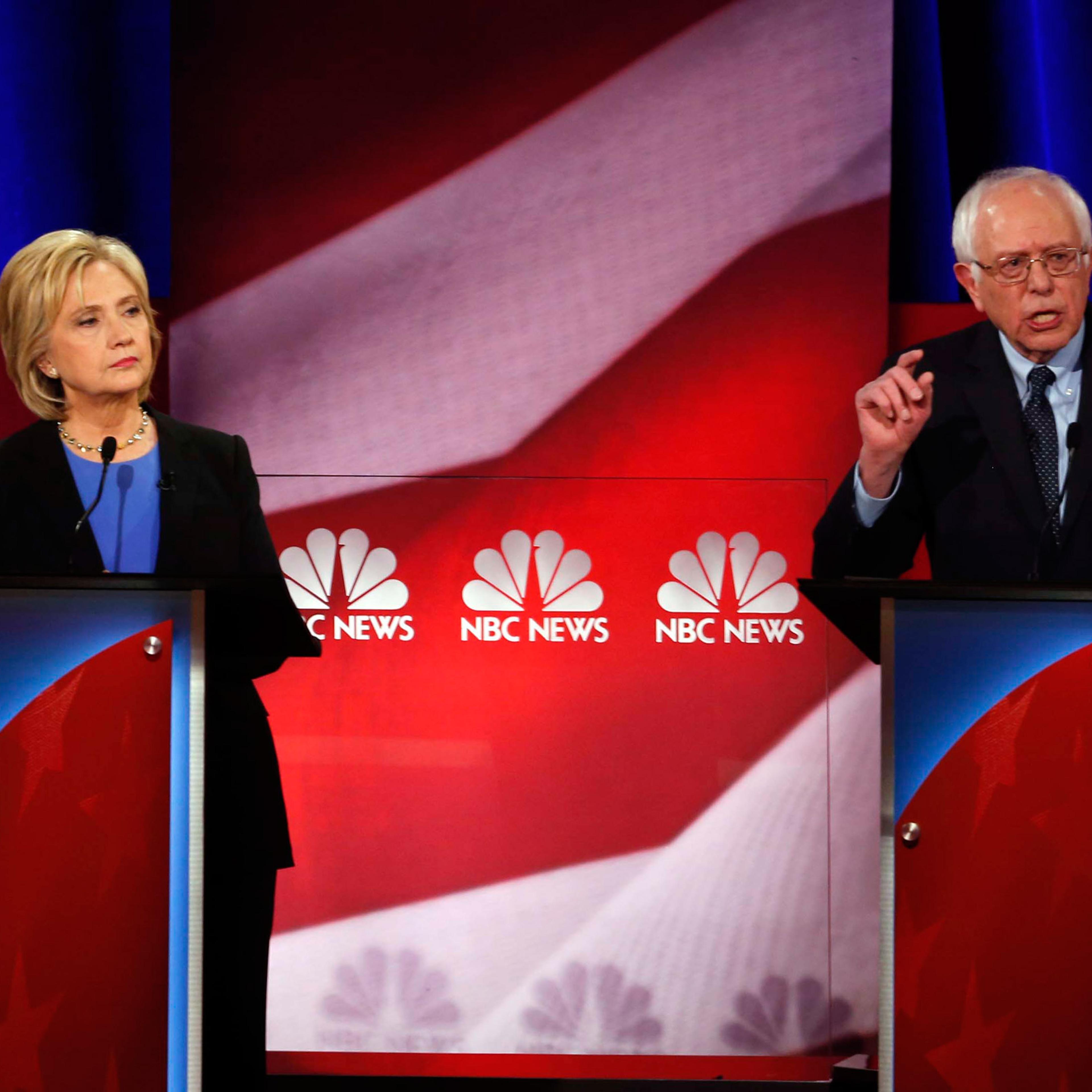 Democratic presidential candidate, Sen. Bernie Sanders, I-Vt, right, speaks, as Democratic presidential candidate, Hillary Clinton listens, at the NBC, YouTube Democratic presidential debate at the Gaillard Center, Sunday, Jan. 17, 2016, in Charleston, S