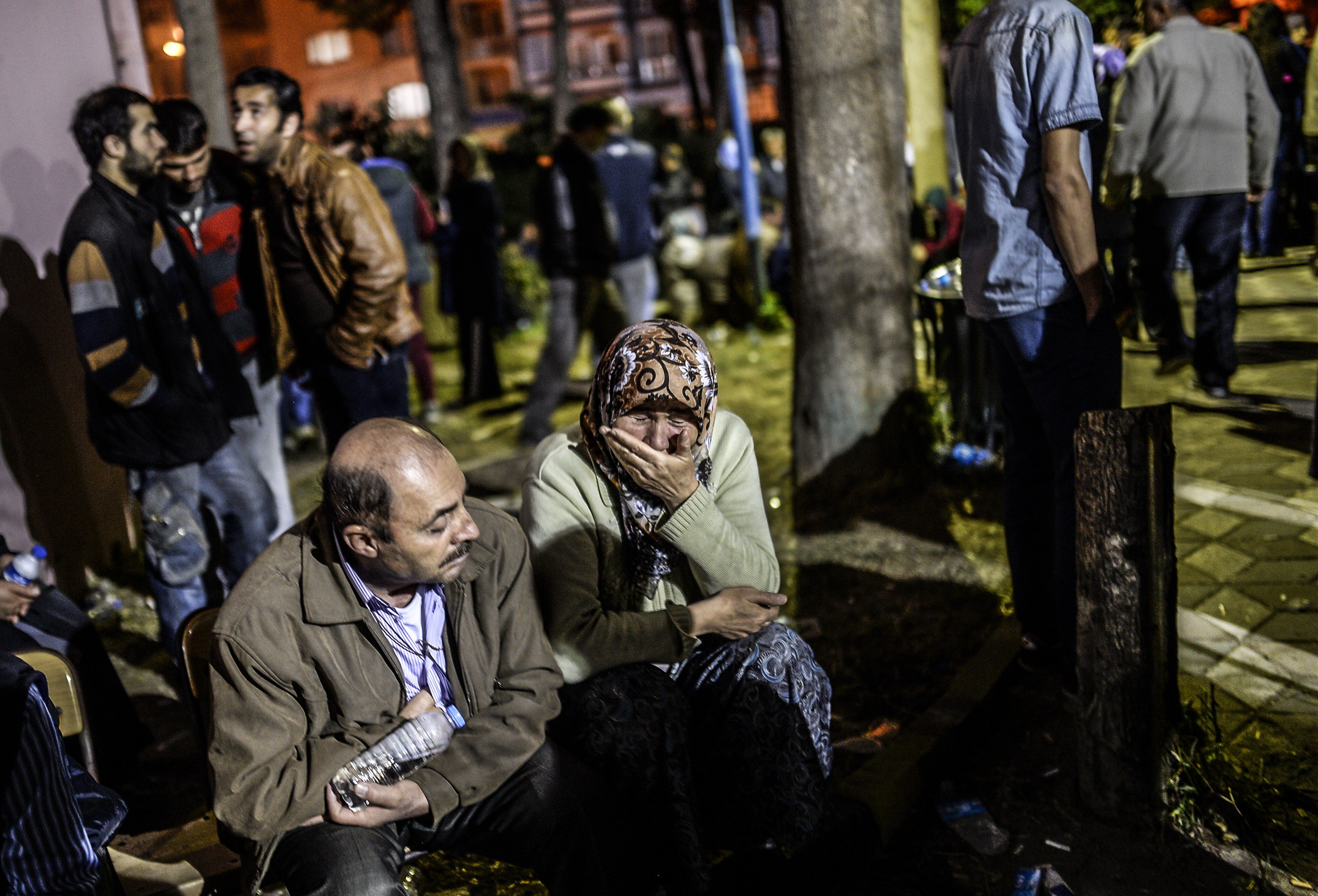 A woman cries as she waits for a news on May 14, 2014.
