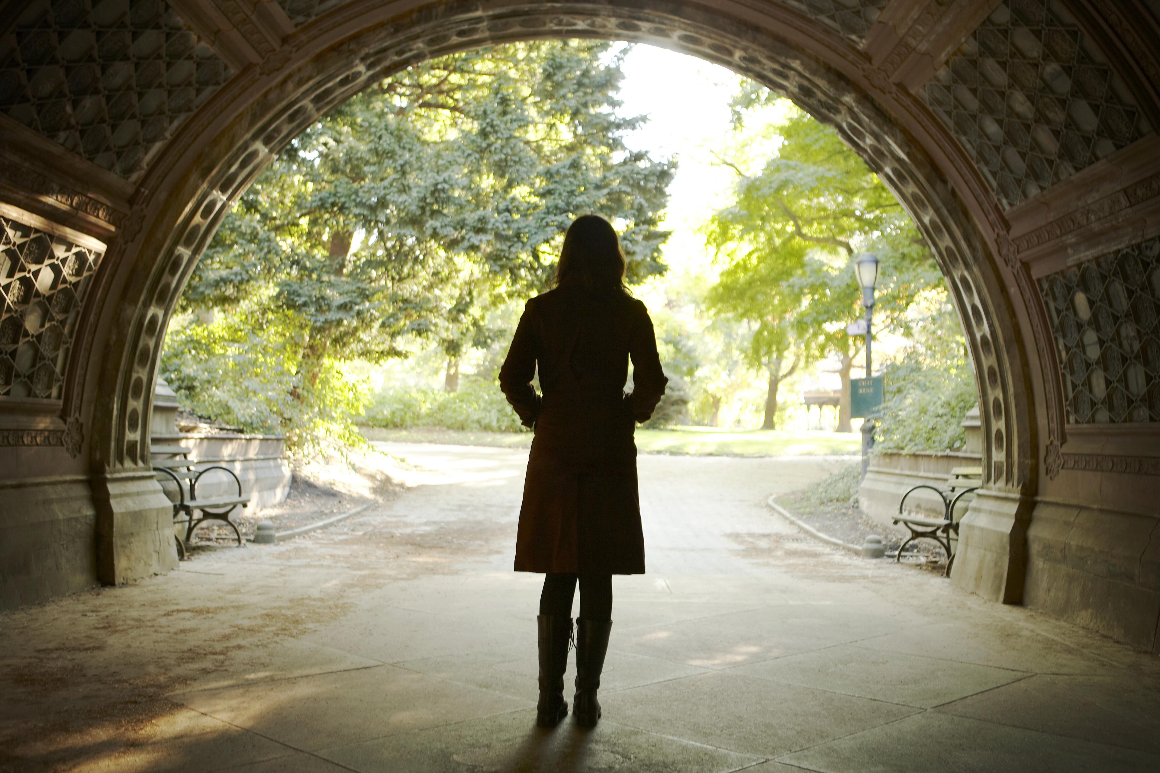 Woman walking college campus