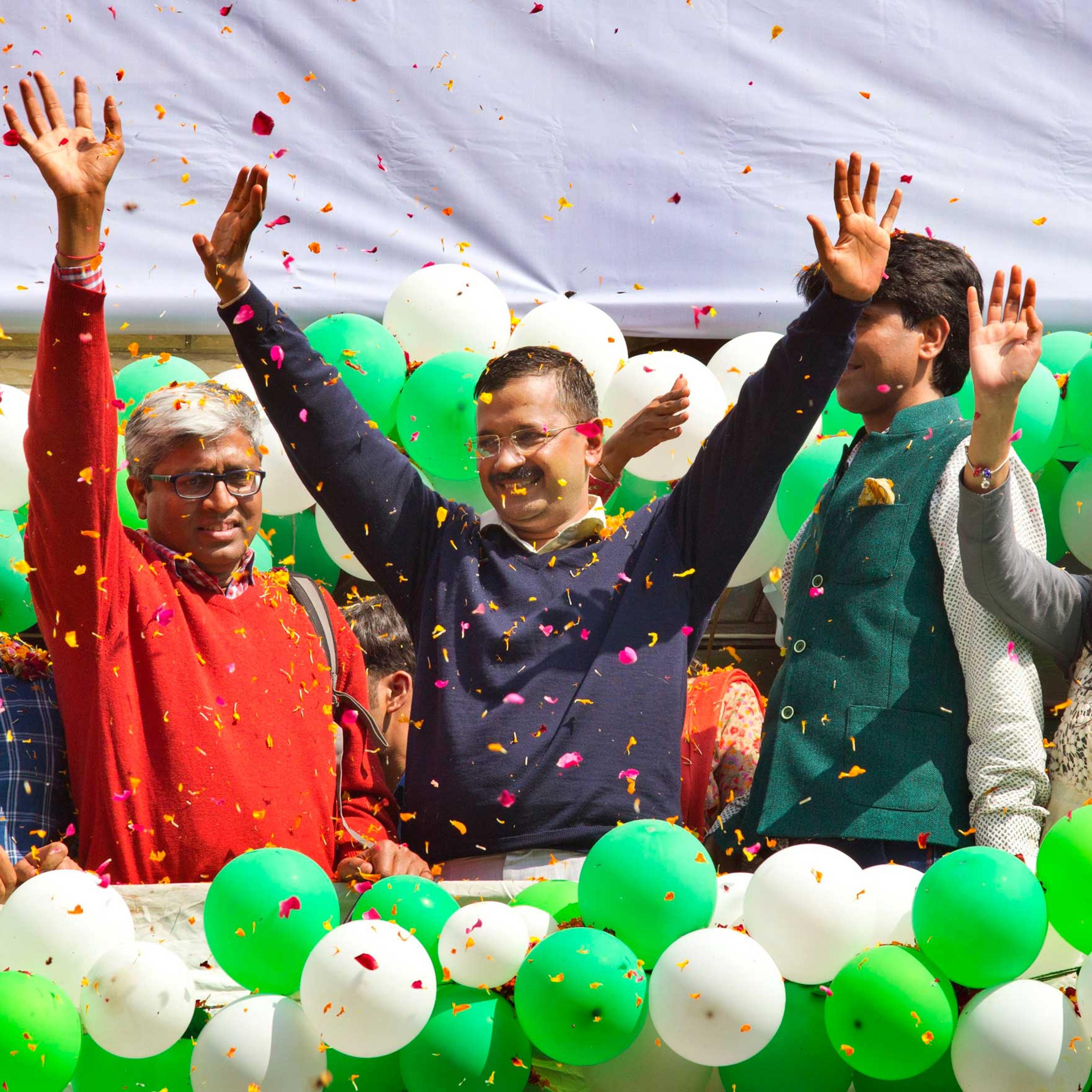 Indian Aam Aadmi Party leader Arvind Kejriwal speaks to supporters as he celebrates victory in the state assembly elections outside the party's headquarters in New Delhi on Feb. 10, 2015.