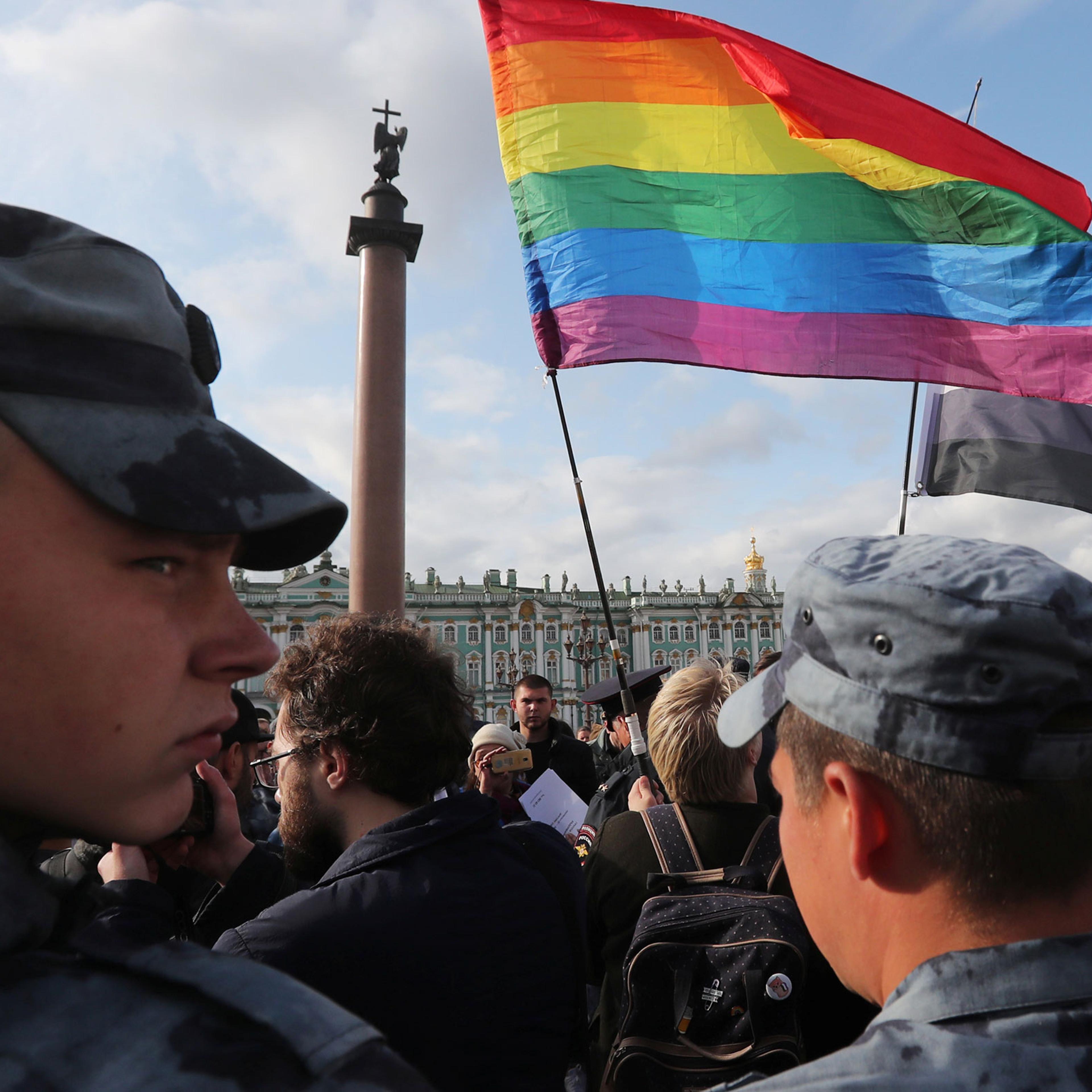 Law enforcement officers block participants of the LGBT community rally in Saint Petersburg