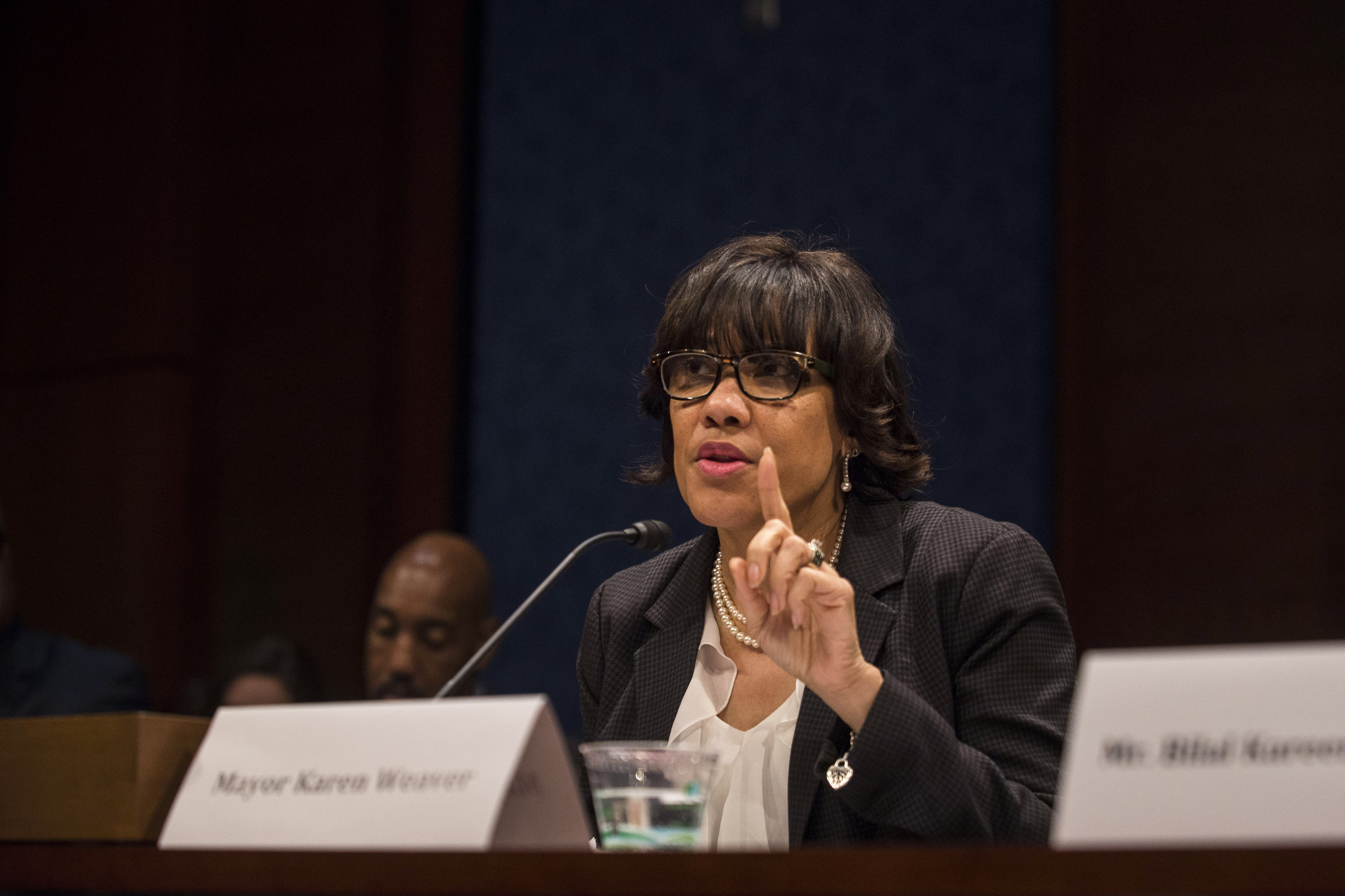 flint michigan democratic hearing testify