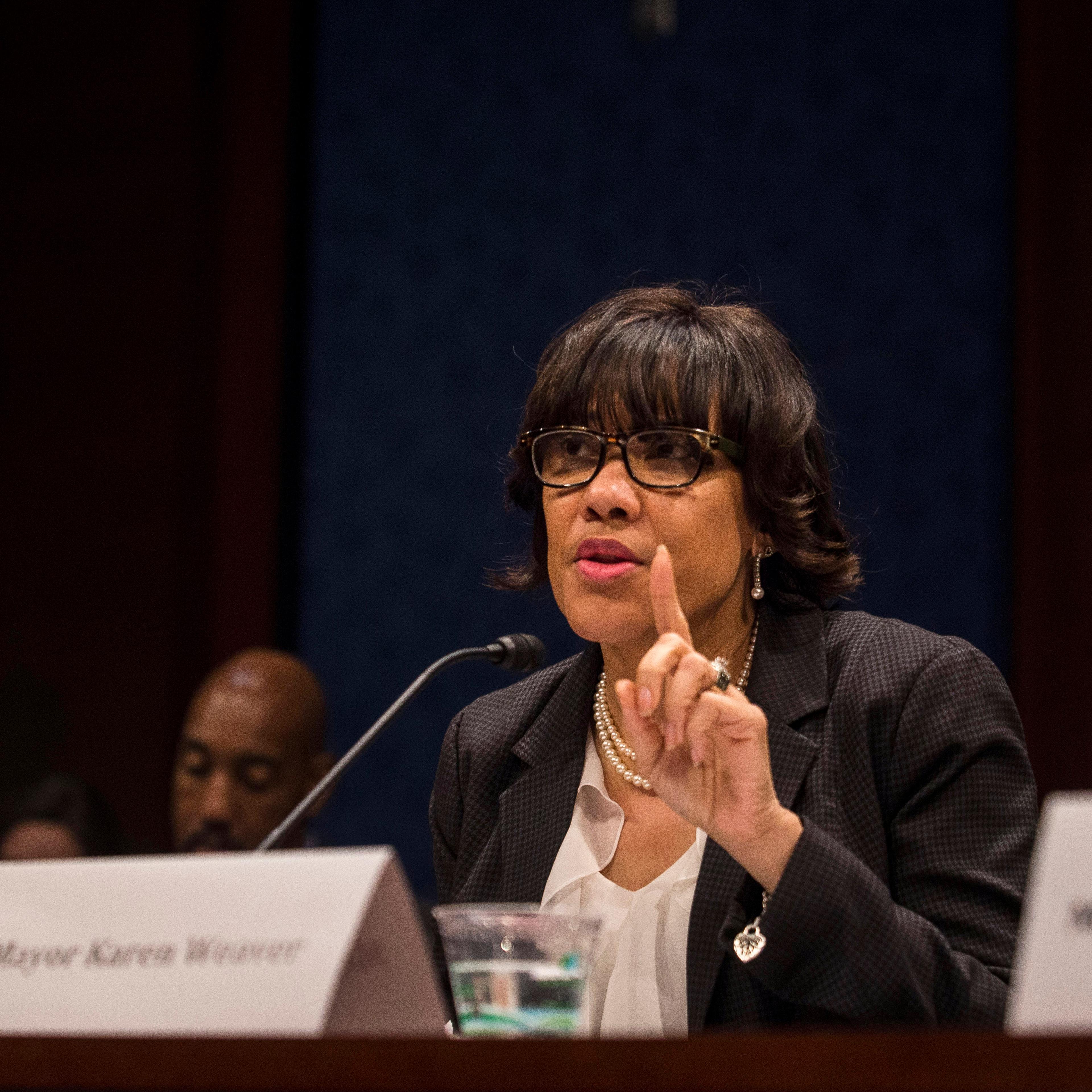 flint michigan democratic hearing testify