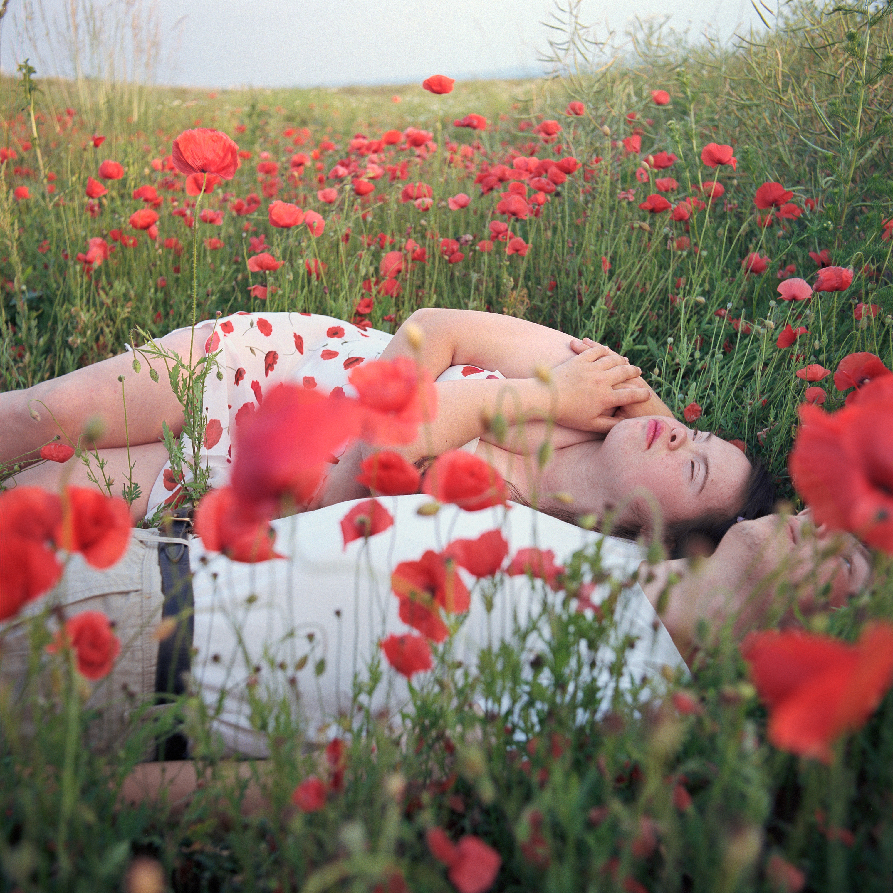 Sofie in the poppyfield with boyfriend Andy, Eilenstedt, Germany, Summer 2018