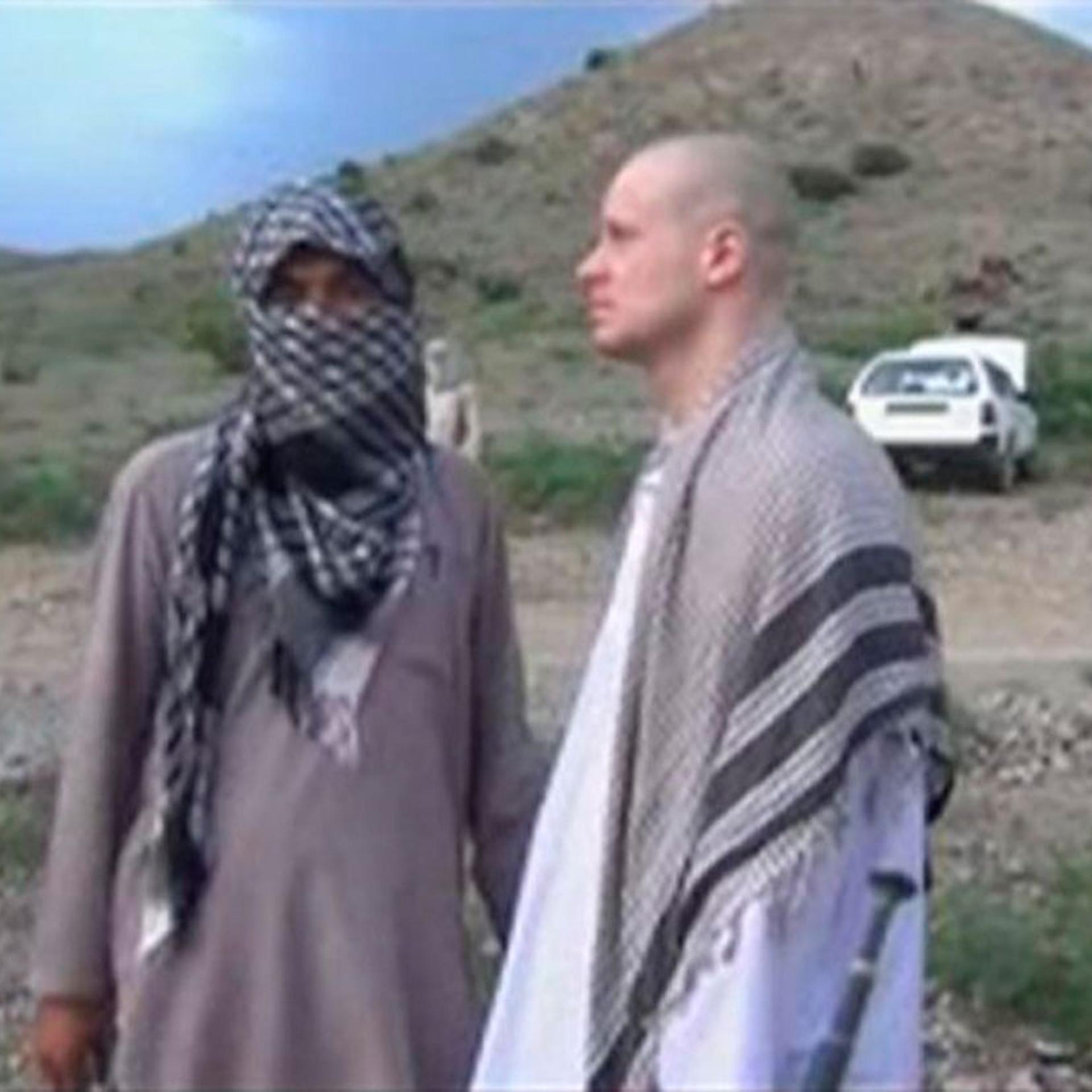 U.S. Army Sergeant Bowe Bergdahl waits before being released at the Afghan border