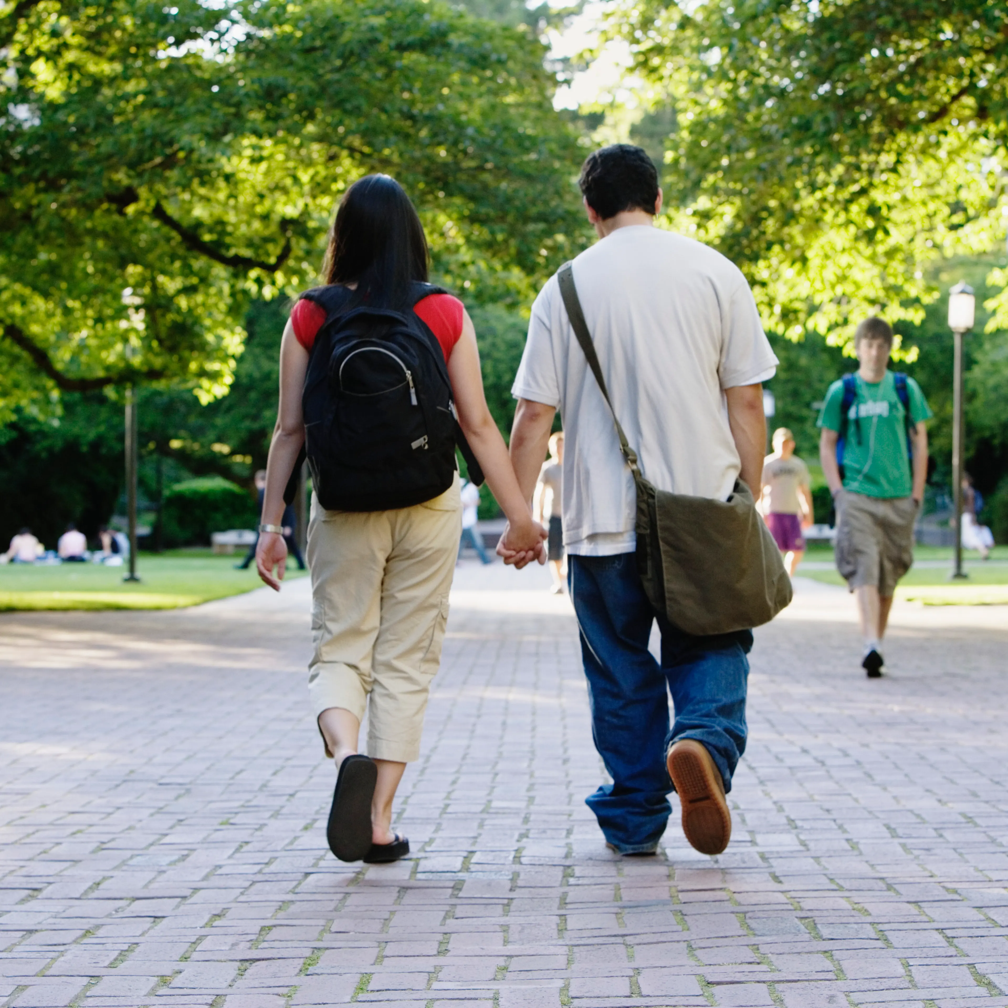 Couple walking outside holding hands