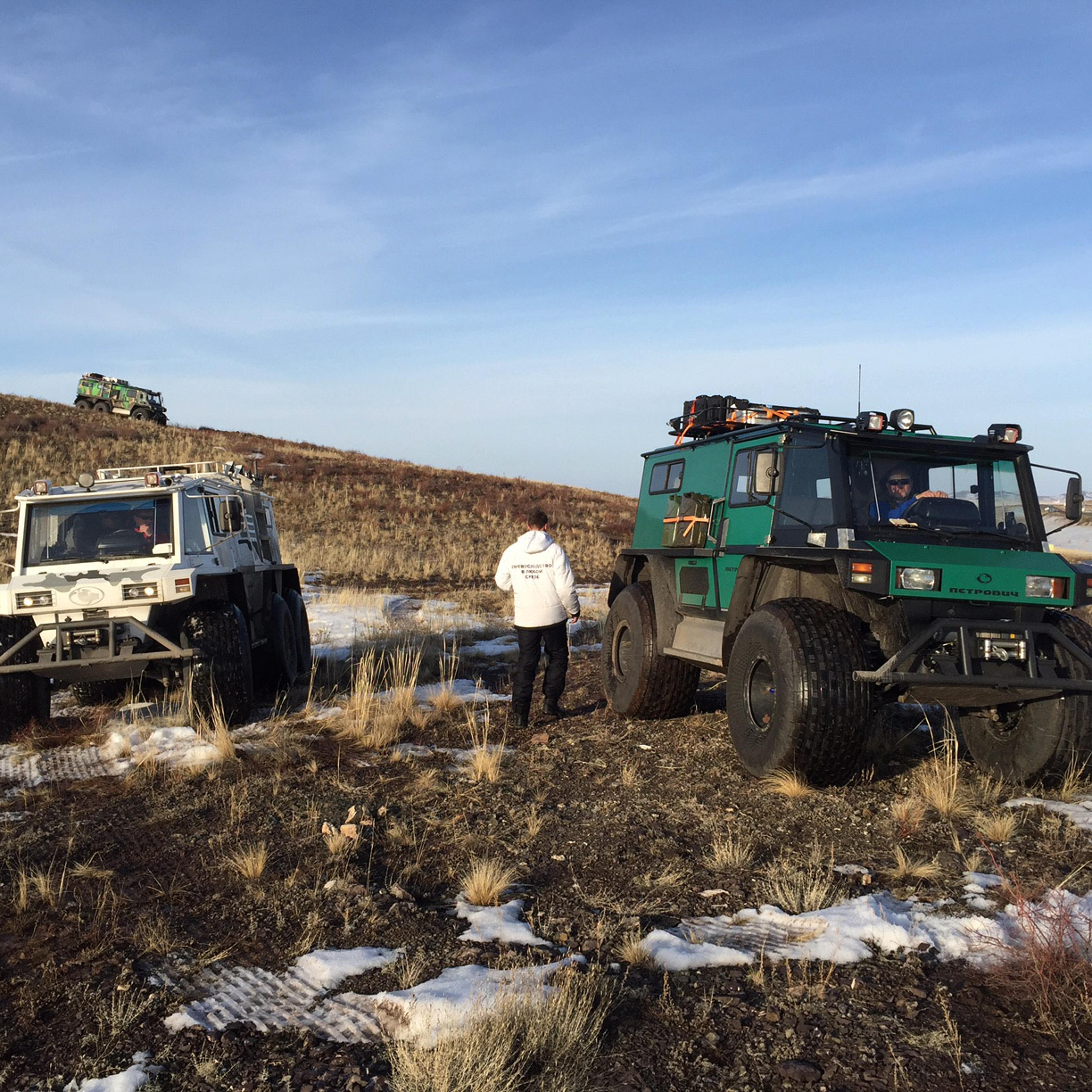 All-terrain vehicles make their way to the landing site about 100km outside Karaganda, Kazakhstan, Feb. 29, 2016.