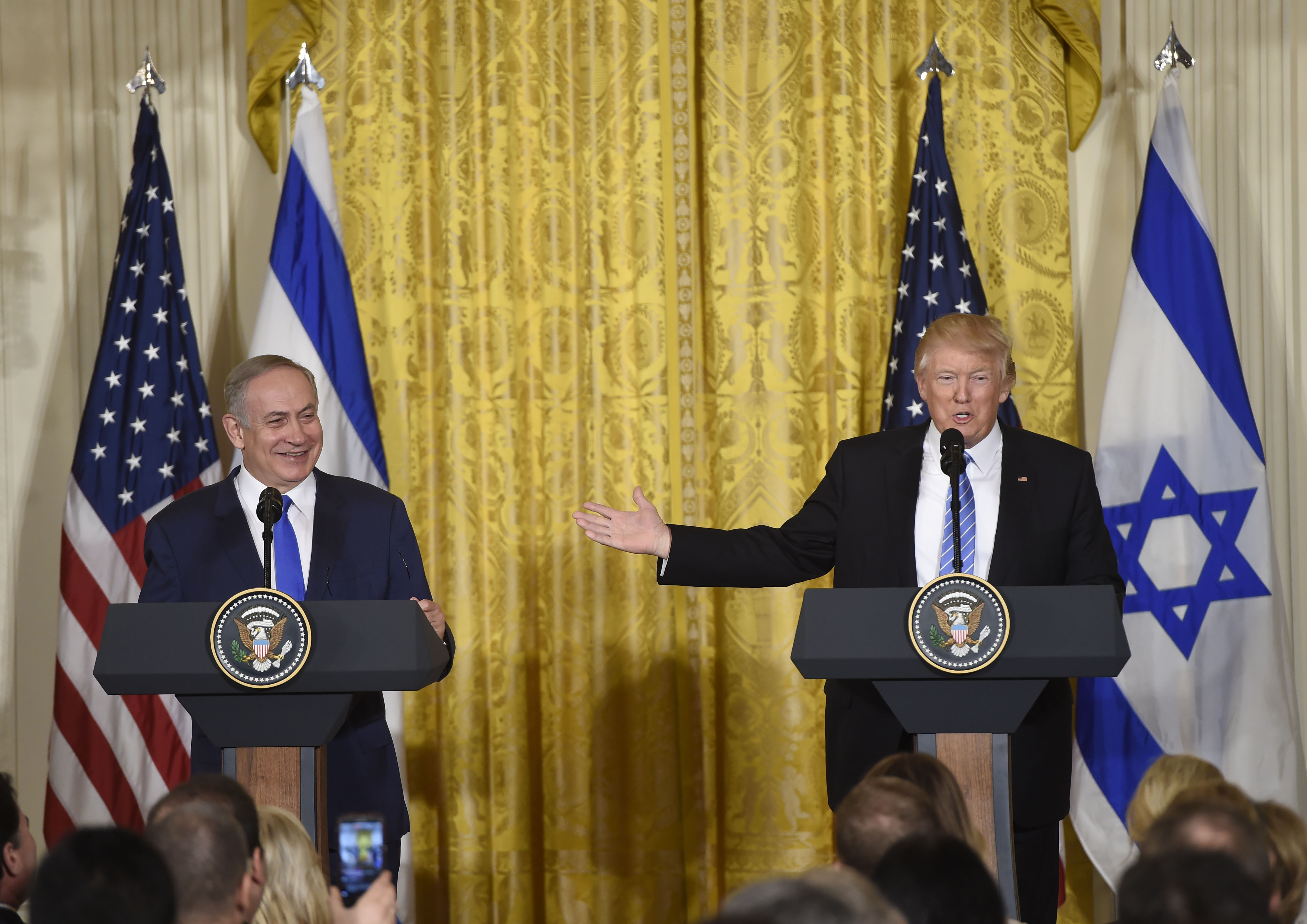 US President Donald Trump and Israeli Prime Minister Benjamin Netanyahu hold a joint press conference in the East Room of the White House in Washington, DC, Feb. 15, 2017.