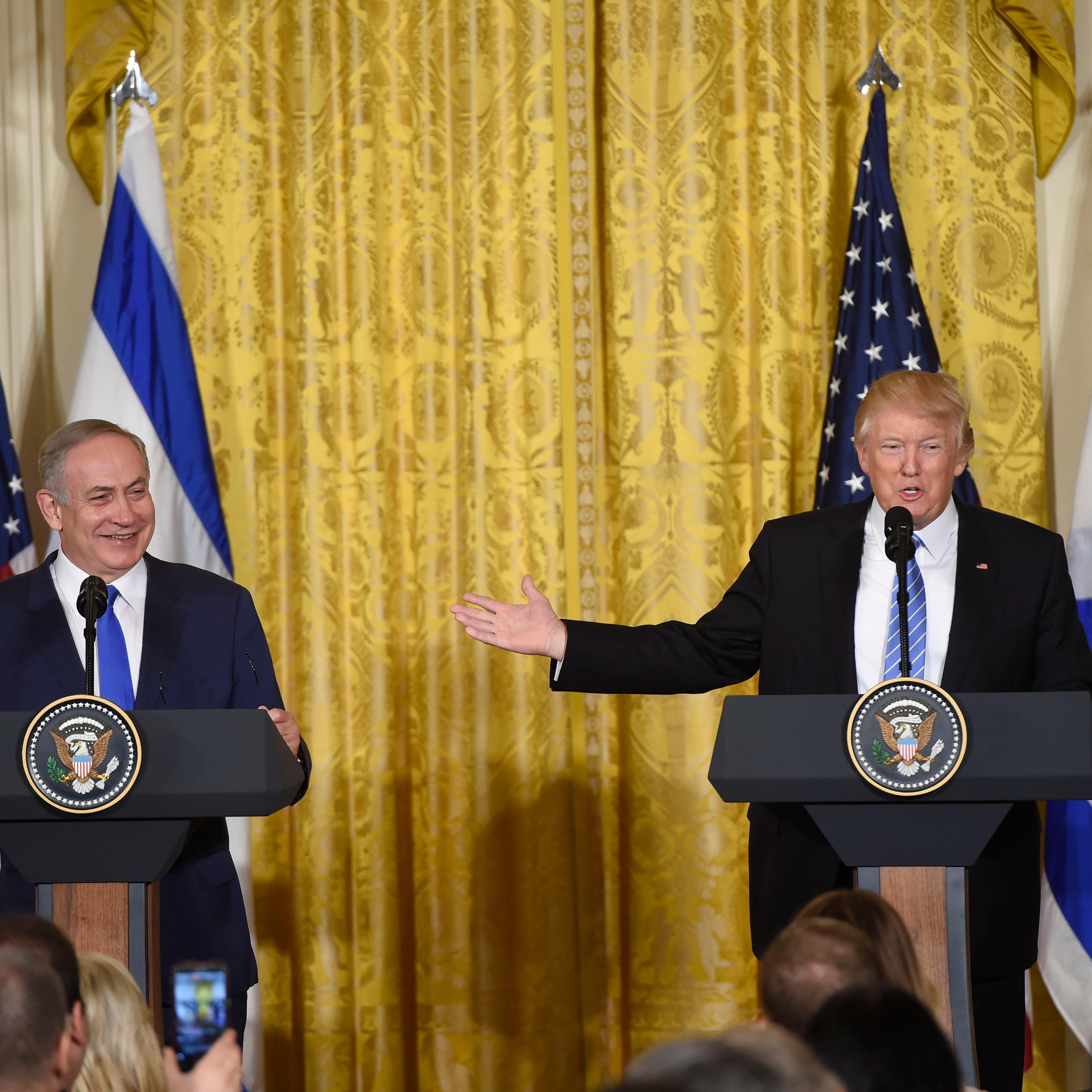 US President Donald Trump and Israeli Prime Minister Benjamin Netanyahu hold a joint press conference in the East Room of the White House in Washington, DC, Feb. 15, 2017.