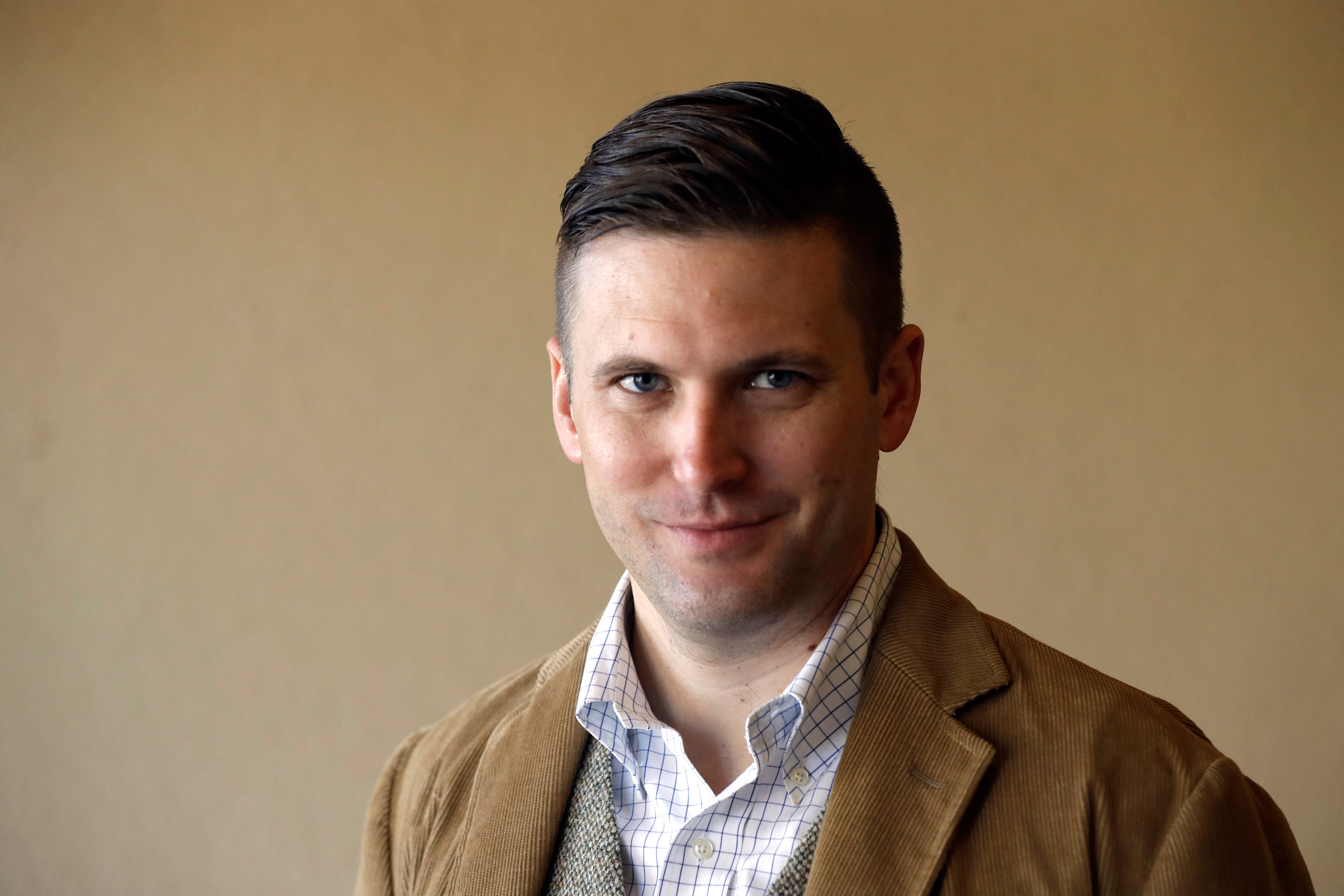 Richard Spencer, a leader in the "alt-right" that mixes racism, white nationalism and populism, poses between interviews Tuesday, Dec. 6, 2016, in College Station, Texas. Spencer is scheduled to speak at Texas A&amp;M University after being invited by a 