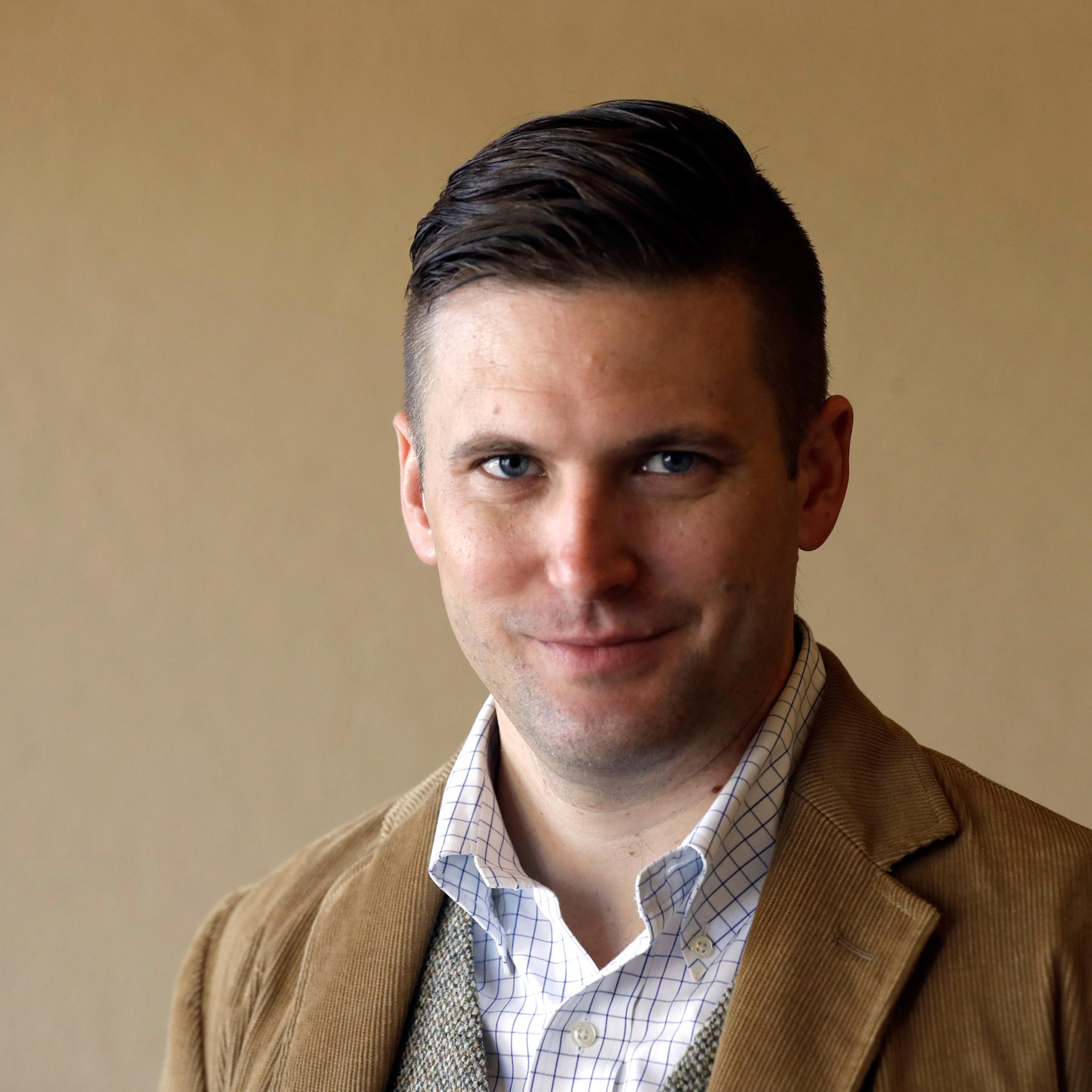 Richard Spencer, a leader in the "alt-right" that mixes racism, white nationalism and populism, poses between interviews Tuesday, Dec. 6, 2016, in College Station, Texas. Spencer is scheduled to speak at Texas A&M University after being invited by a