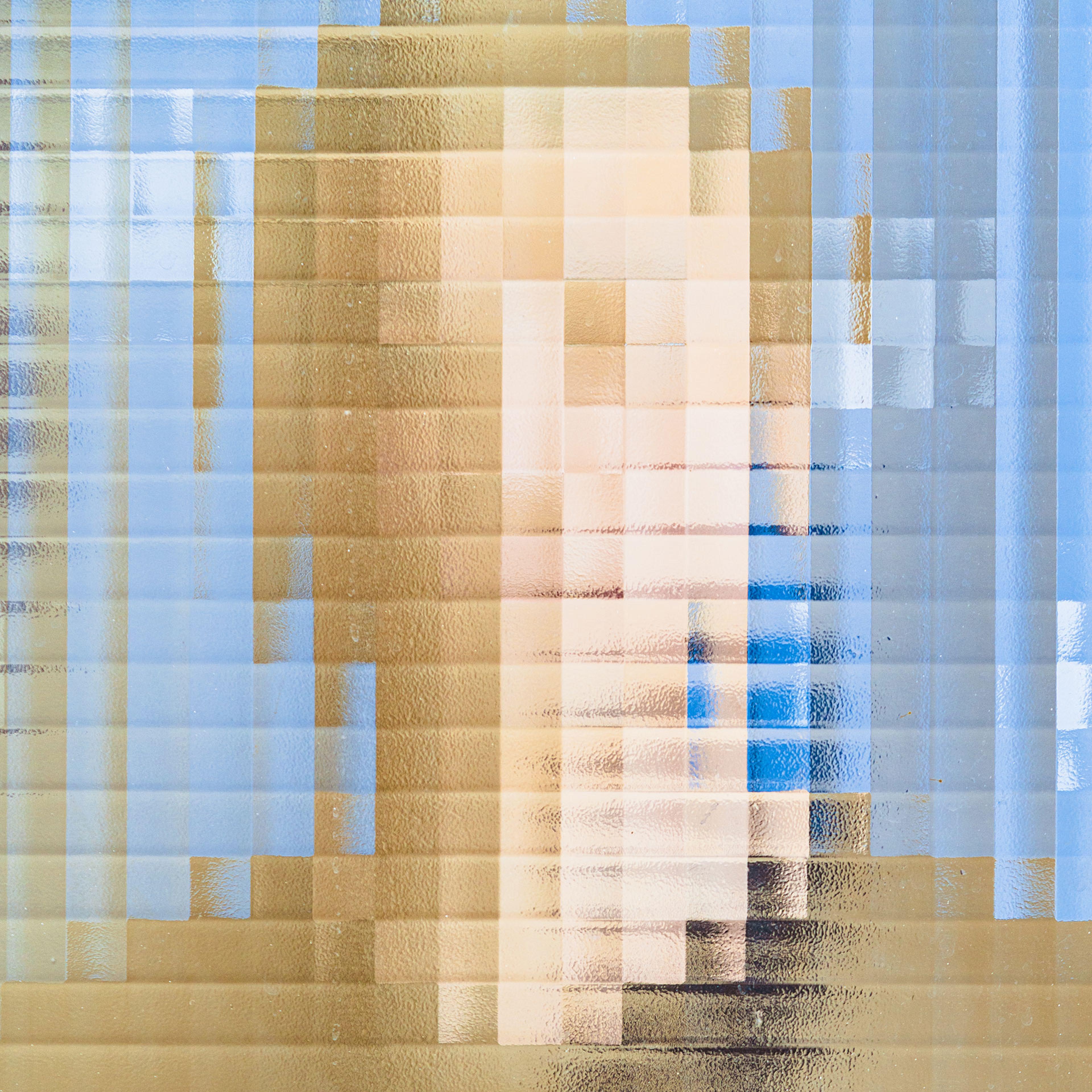 face behind pixelated glass