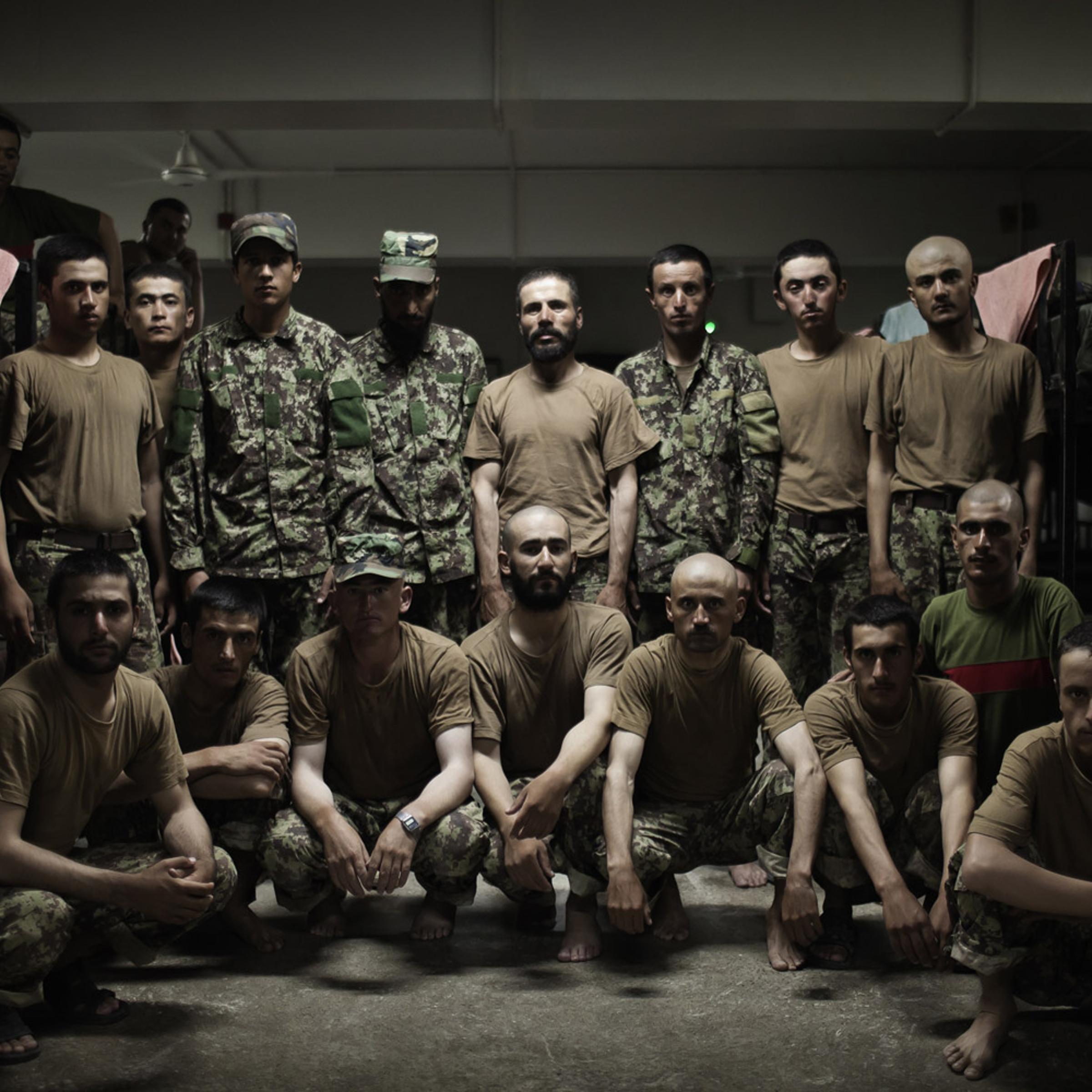 Afghan soldiers from 5th Company, Kandak 166 Training Battalion, Afghan National Army stand for a portrait in a barrack at the Kabul Military Training Centre in Afghanistan on Aug. 22 2011.