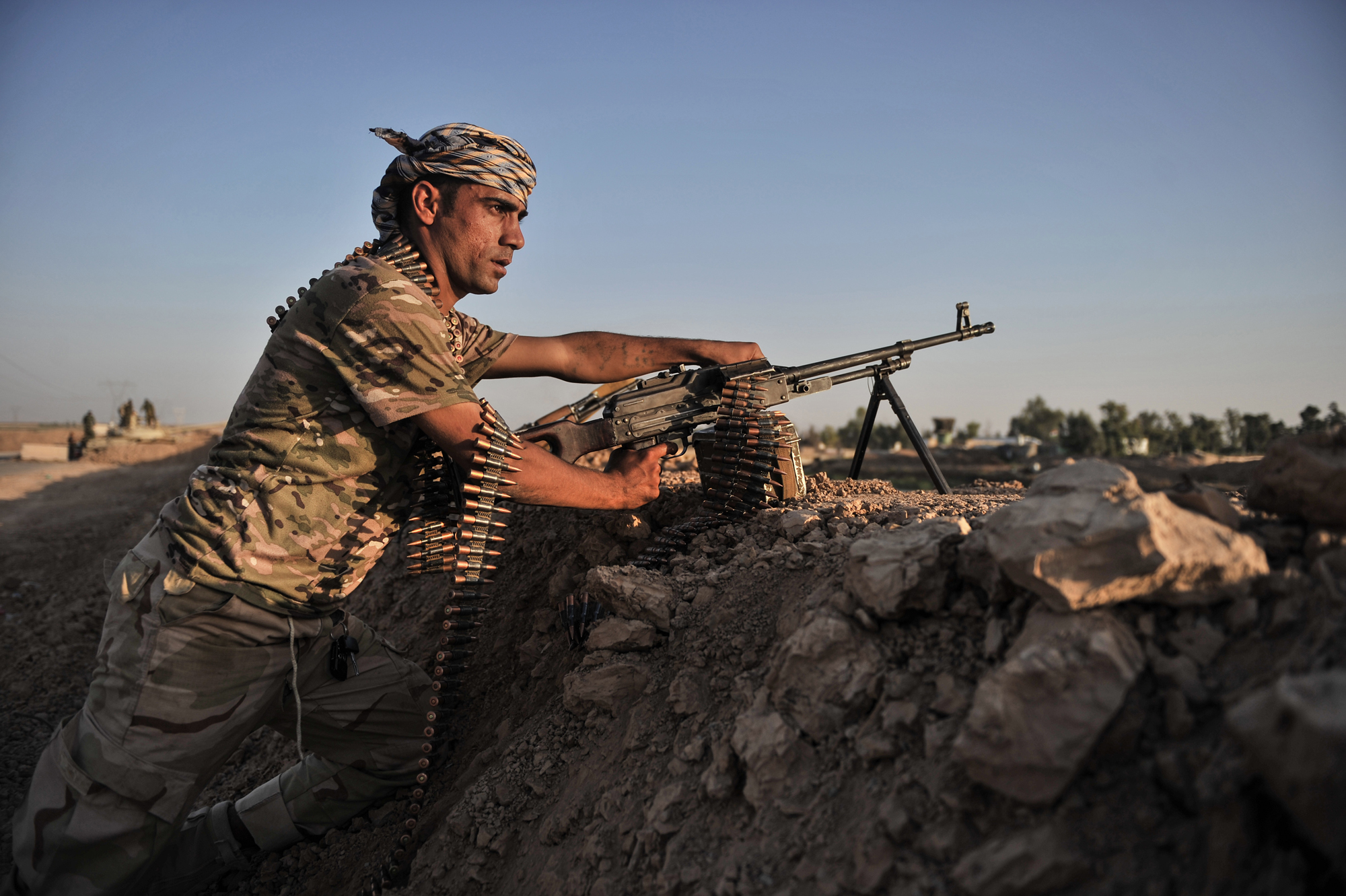 Kurdish Peshmerga forces stand guard in the oil-rich city of Kirkuk against Islamic State of Iraq and Syria (ISIS) on June 17, 2014.