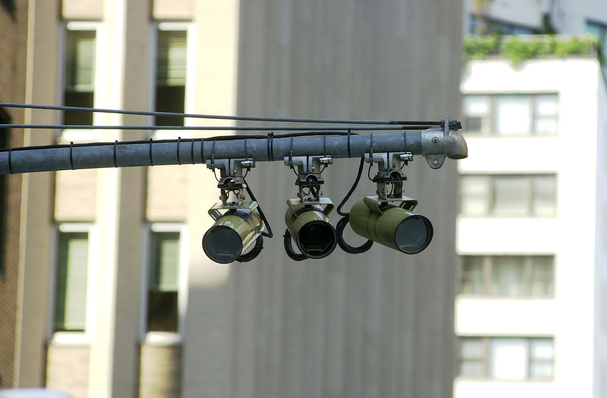 Red-light cameras monitor the traffic at the corner of Secon