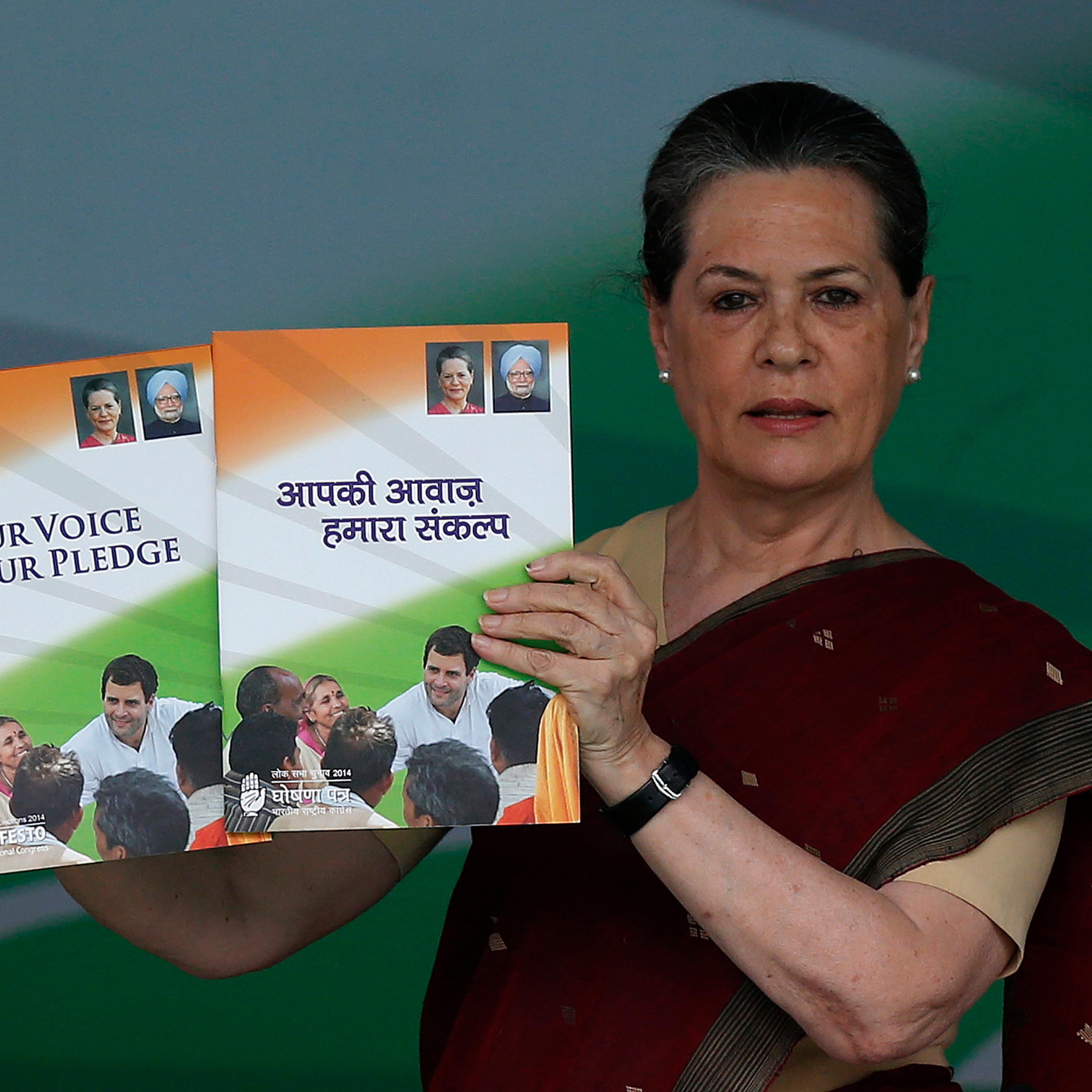 Gandhi Chief of India's ruling Congress party holds her party's election manifesto in New Delhi