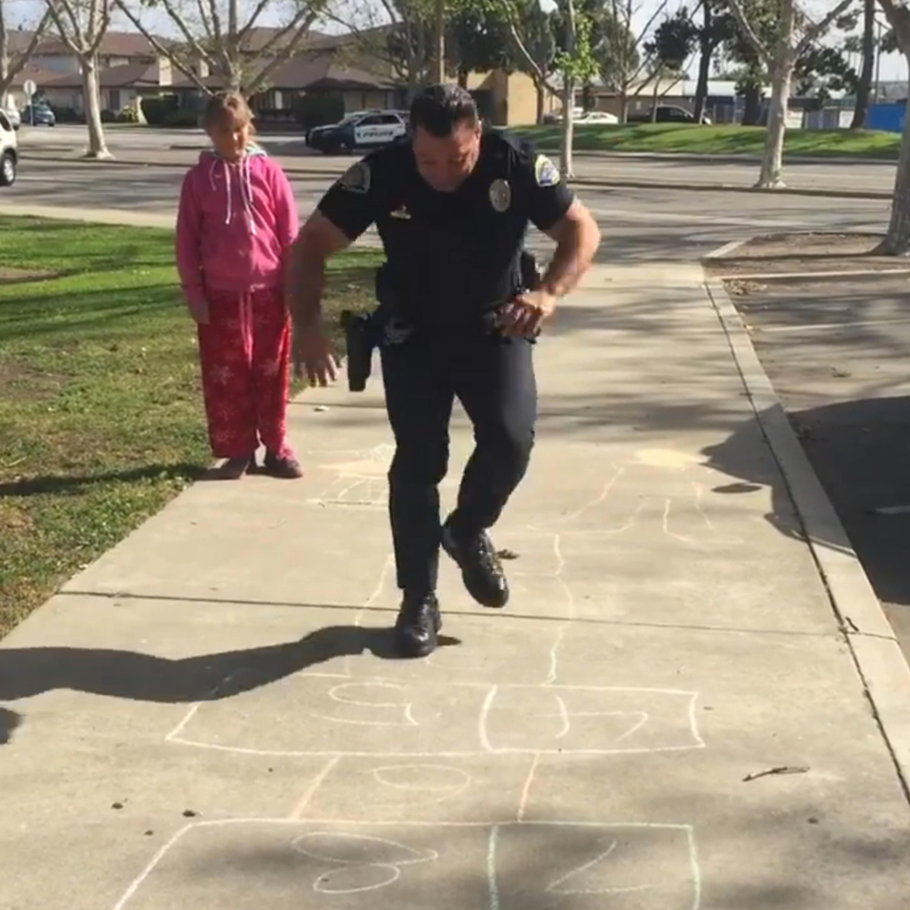 Police Hopscotch homeless girl