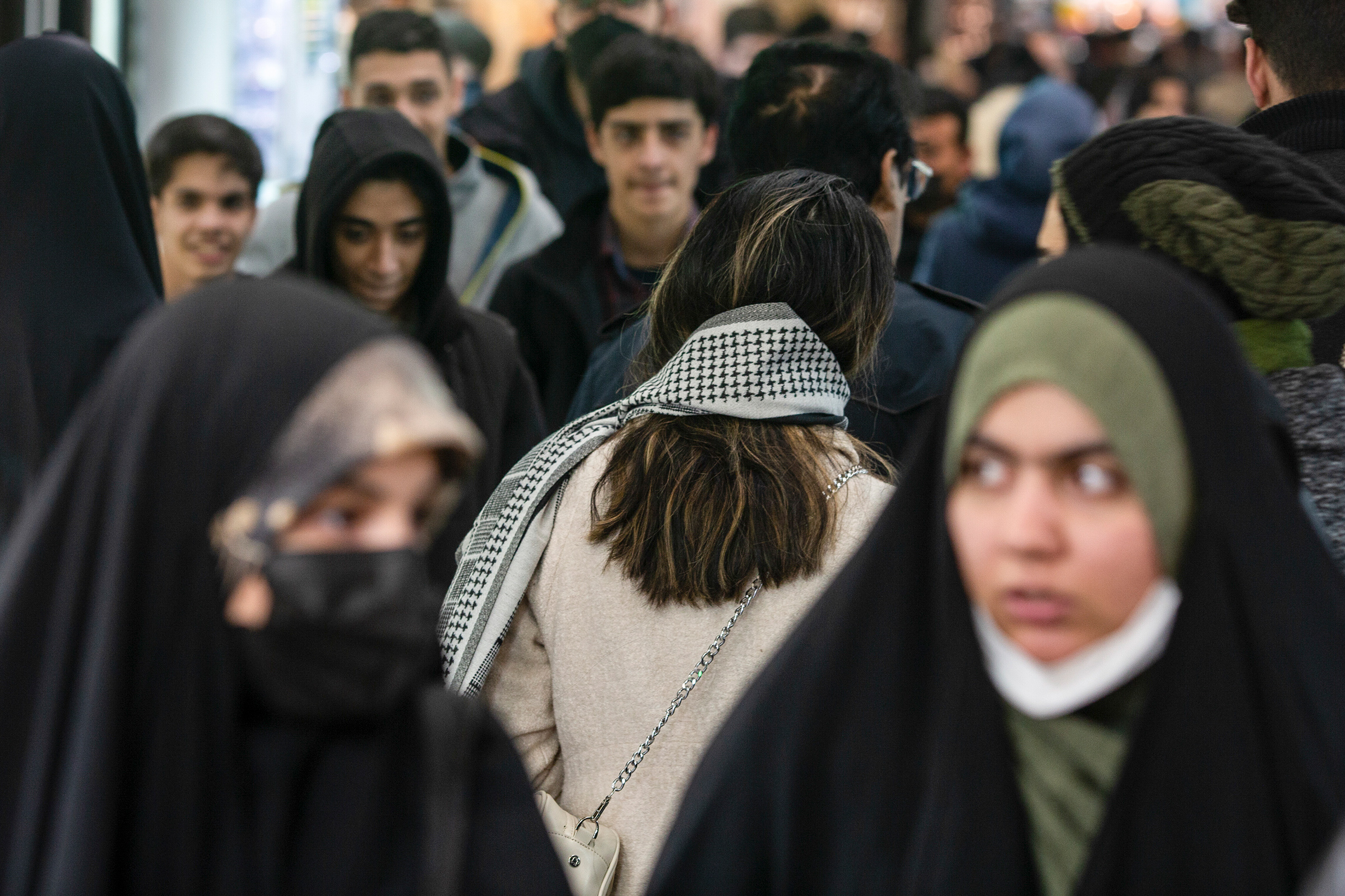 A woman, sans-head covering, at the Tajrish Bazaar in Tehran on Jan. 28. Defiant resistance to Iran's mandatory hijab law has spread across the country after nationwide protests that erupted last year.