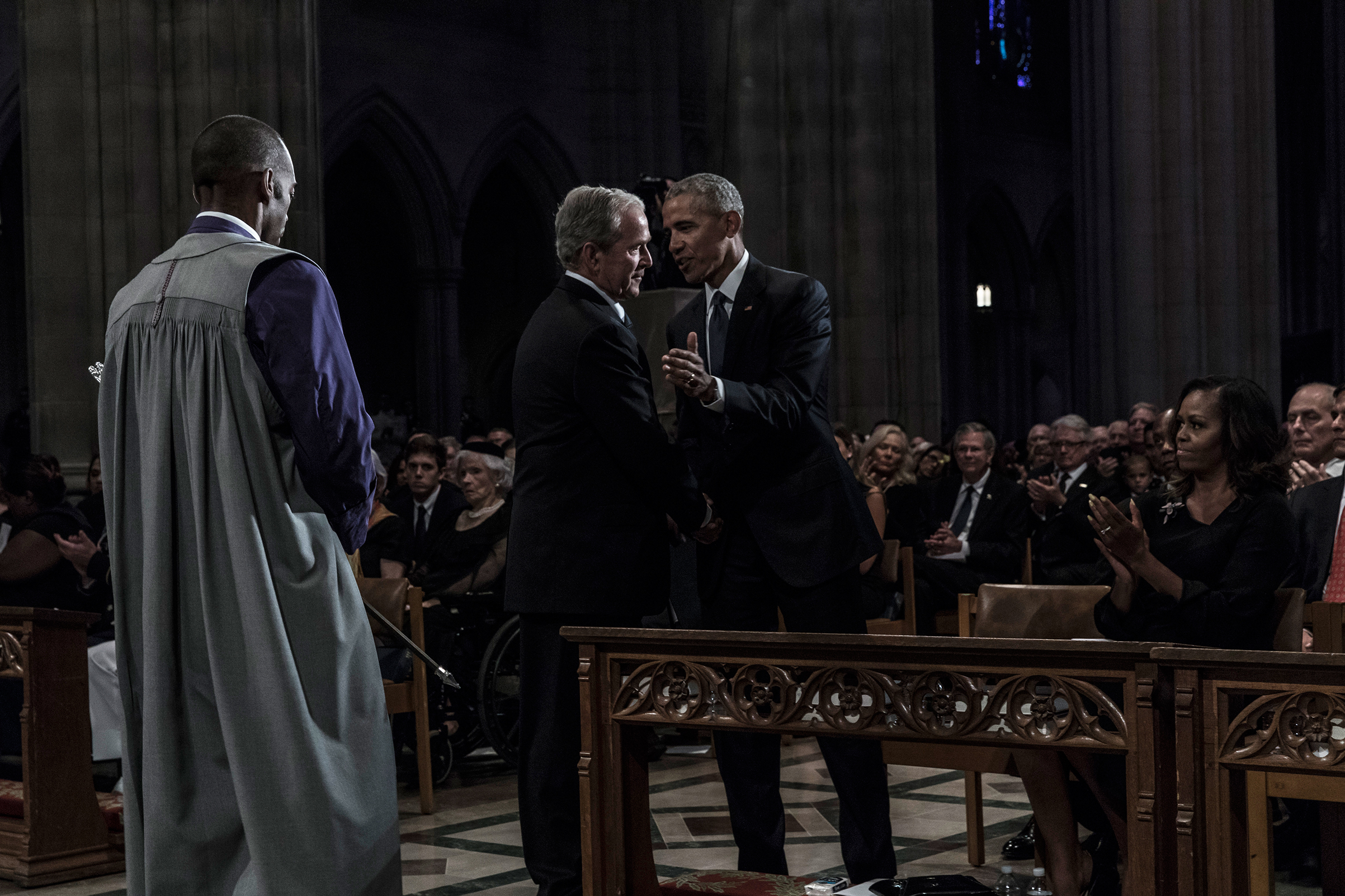 Former US Presidents Barack Obama, and George W. Bush during a memorial service for Senator John McCain at the Washington National Cathedral on September 1, 2018. 