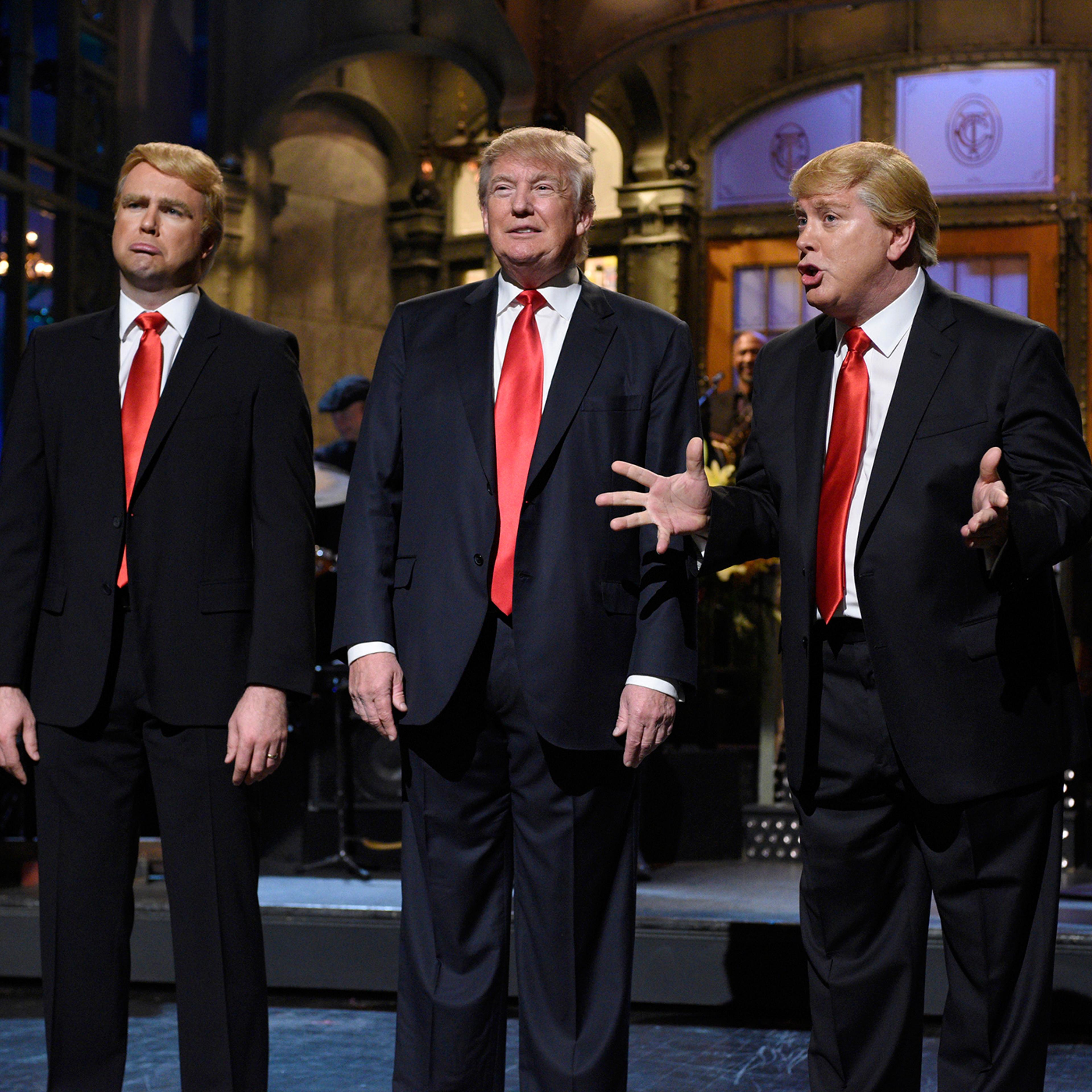 Saturday Night Live "Donald Trump" Episode with (l-r) Taran Killam, Donald Trump, and Darrell Hammond during the monologue on November 7, 2015.