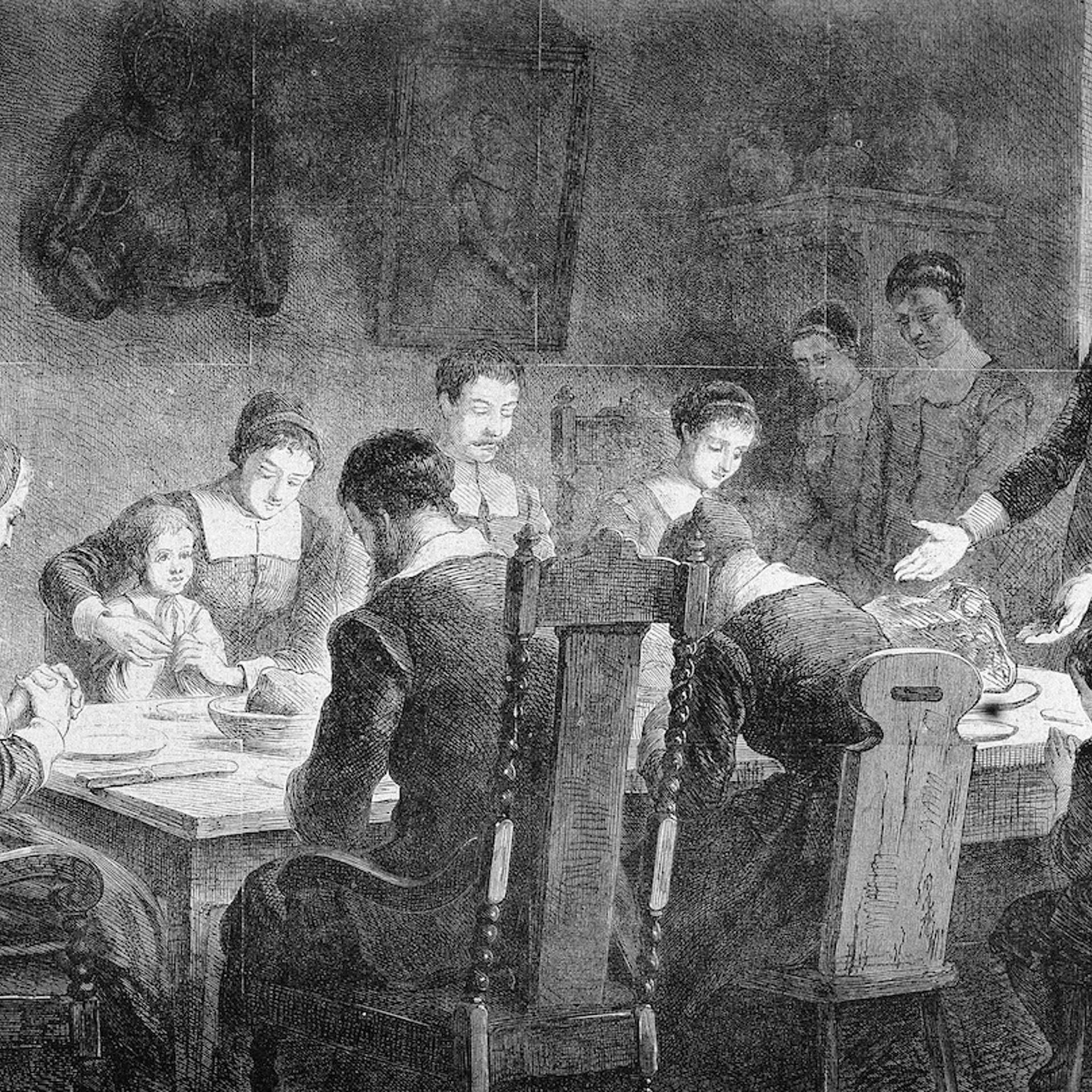 Puritans Pray At Thanksgiving Dinner