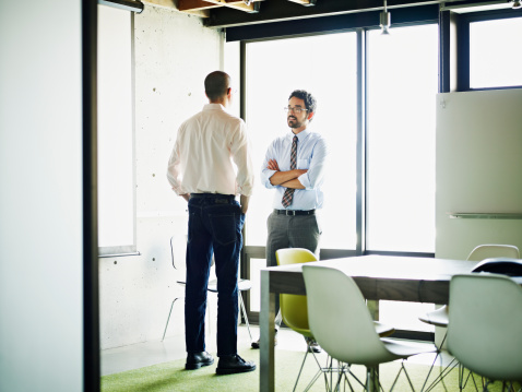 two-businessmen-room