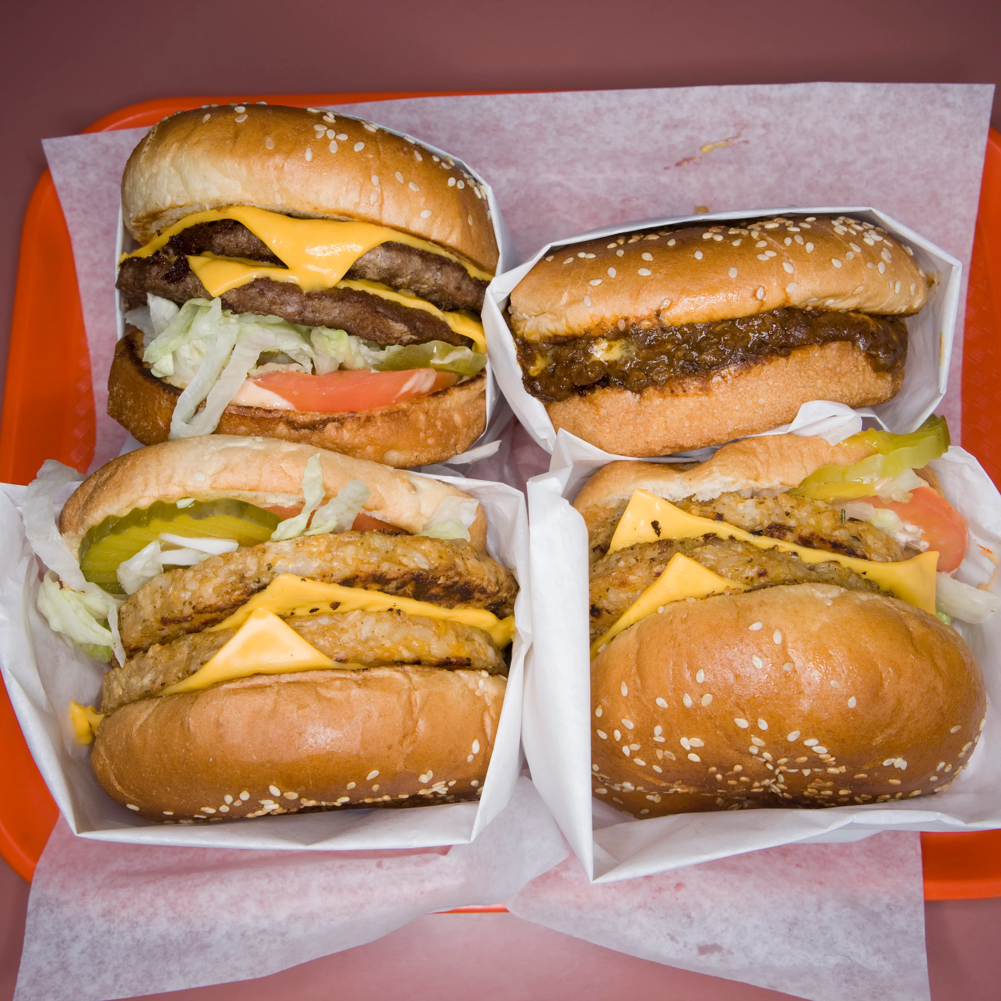 a fast food tray full of hamburgers