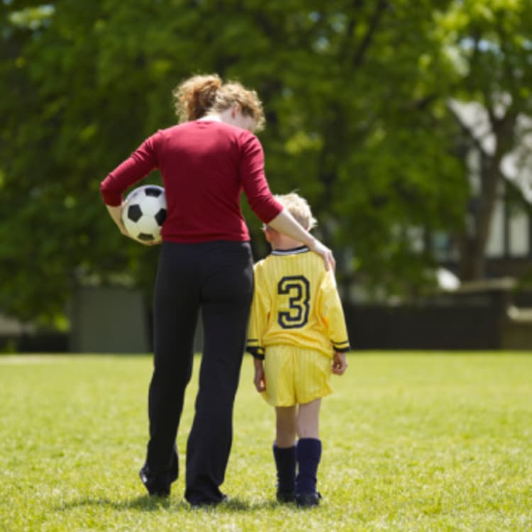 mom-son-rear-view-soccer