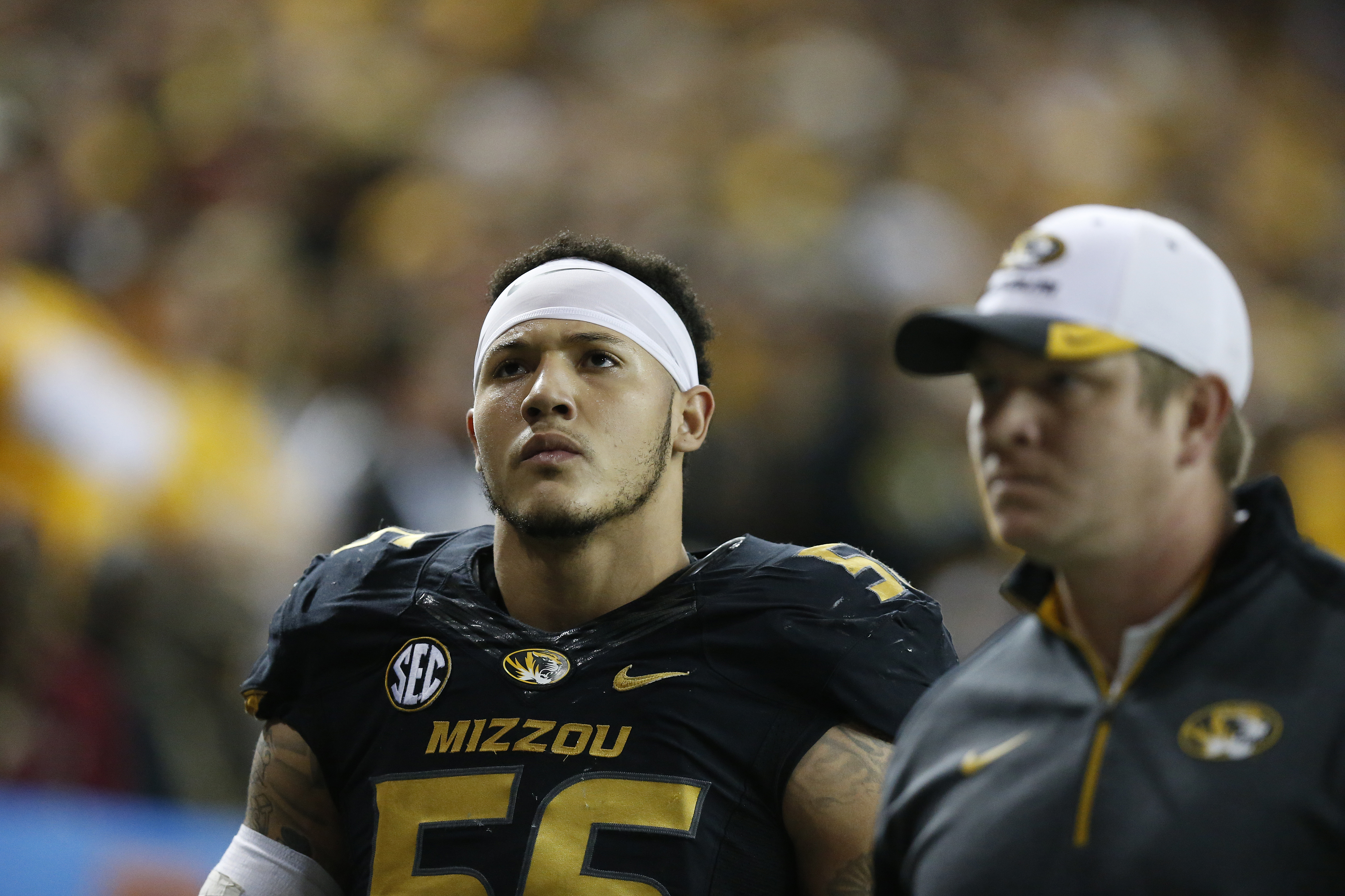 Missouri defensive lineman Shane Ray (56) walks off the field after being ejected from the game for a late hit against Alabama quarterback Blake Sims during the first half of the Southeastern Conference championship NCAA college football game, Saturday, 