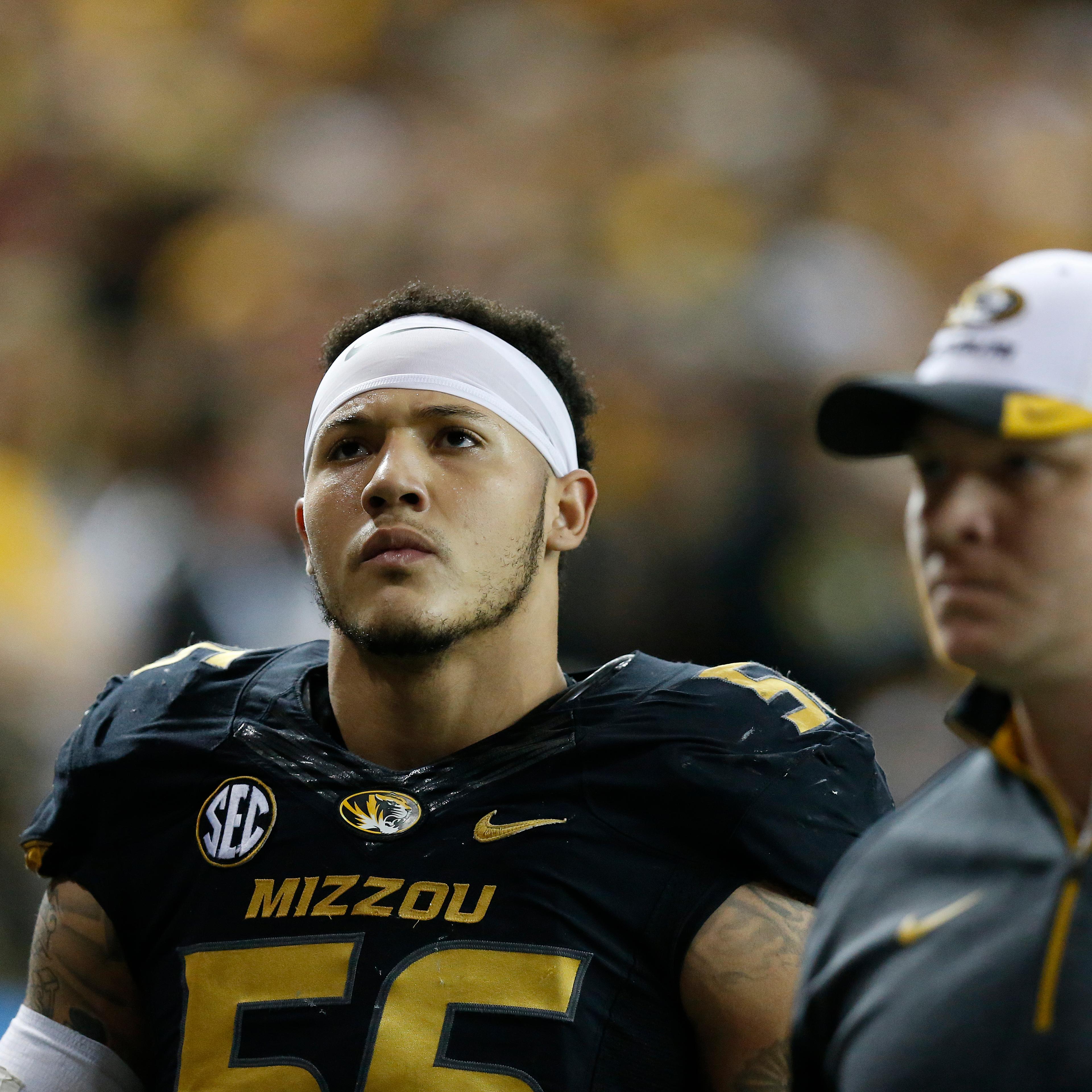 Missouri defensive lineman Shane Ray (56) walks off the field after being ejected from the game for a late hit against Alabama quarterback Blake Sims during the first half of the Southeastern Conference championship NCAA college football game, Saturday,