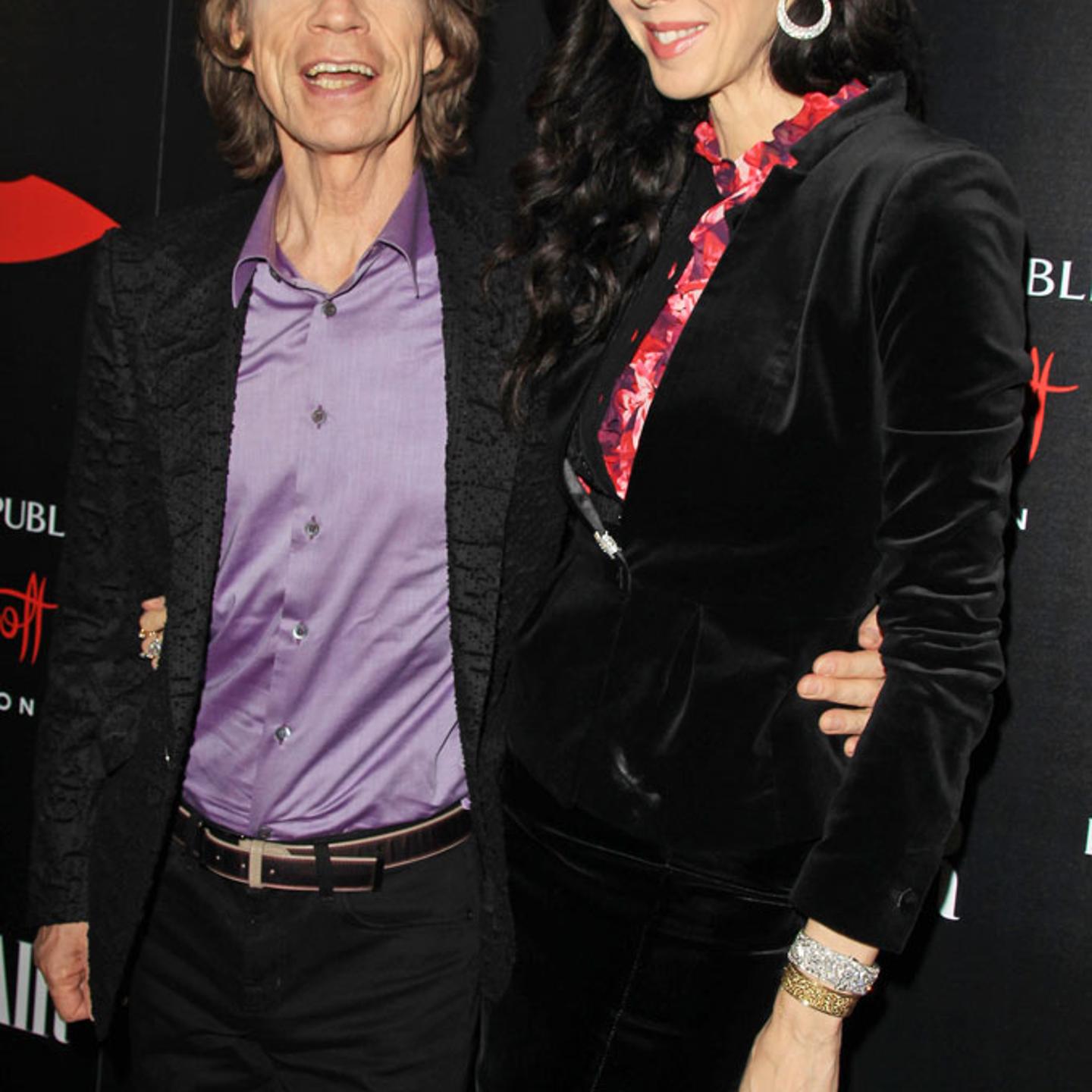 From left: Mick Jagger and L'Wren Scott attend the launch celebration of the Banana Republic L'Wren Scott Collection hosted by Banana Republic, L'Wren Scott and Krista Smith at Chateau Marmont on Nov. 19, 2013 in Los Angeles.