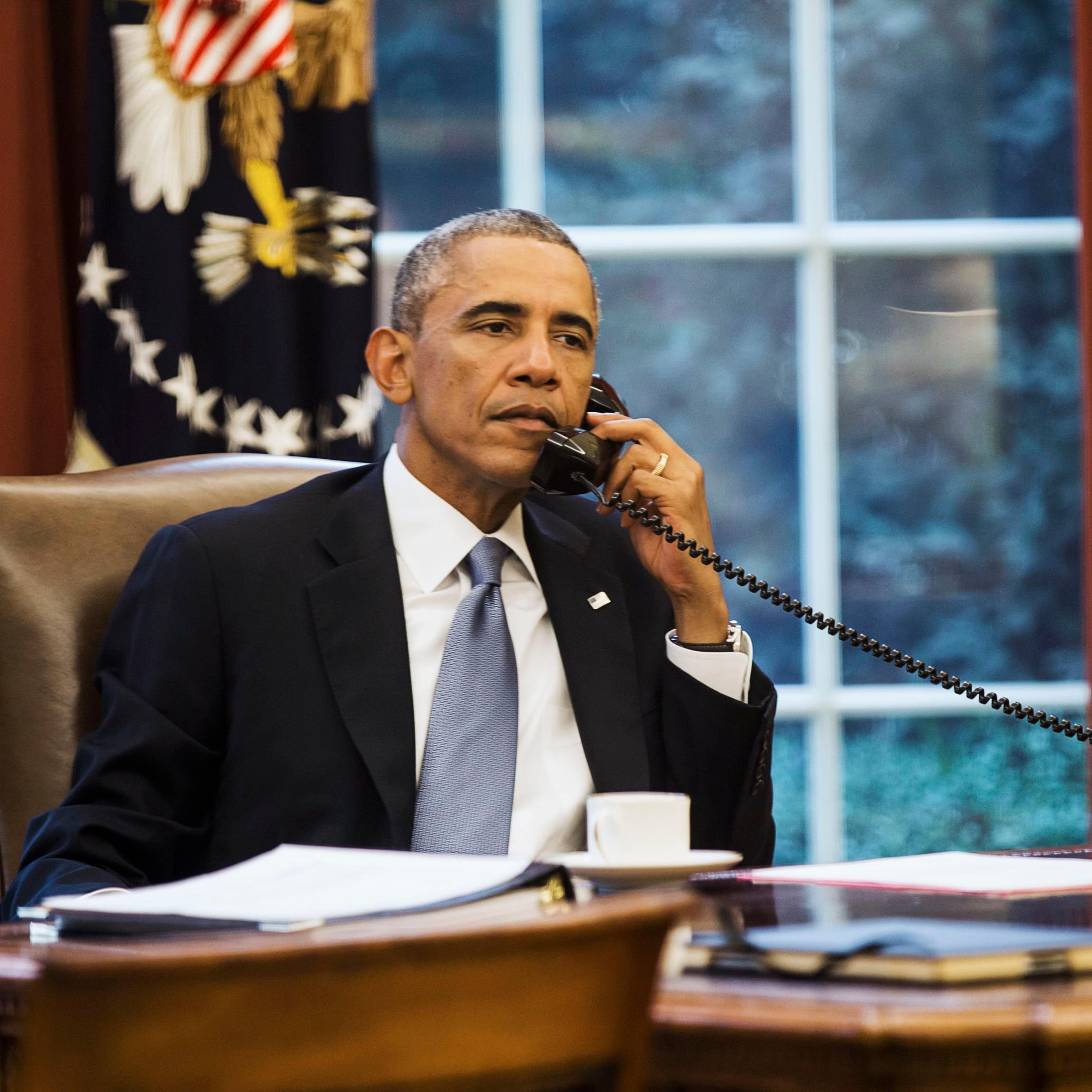 U.S. President Obama speaks on the phone with Saudi Arabia's King Abdullah from the Oval Office of the White House in Washington