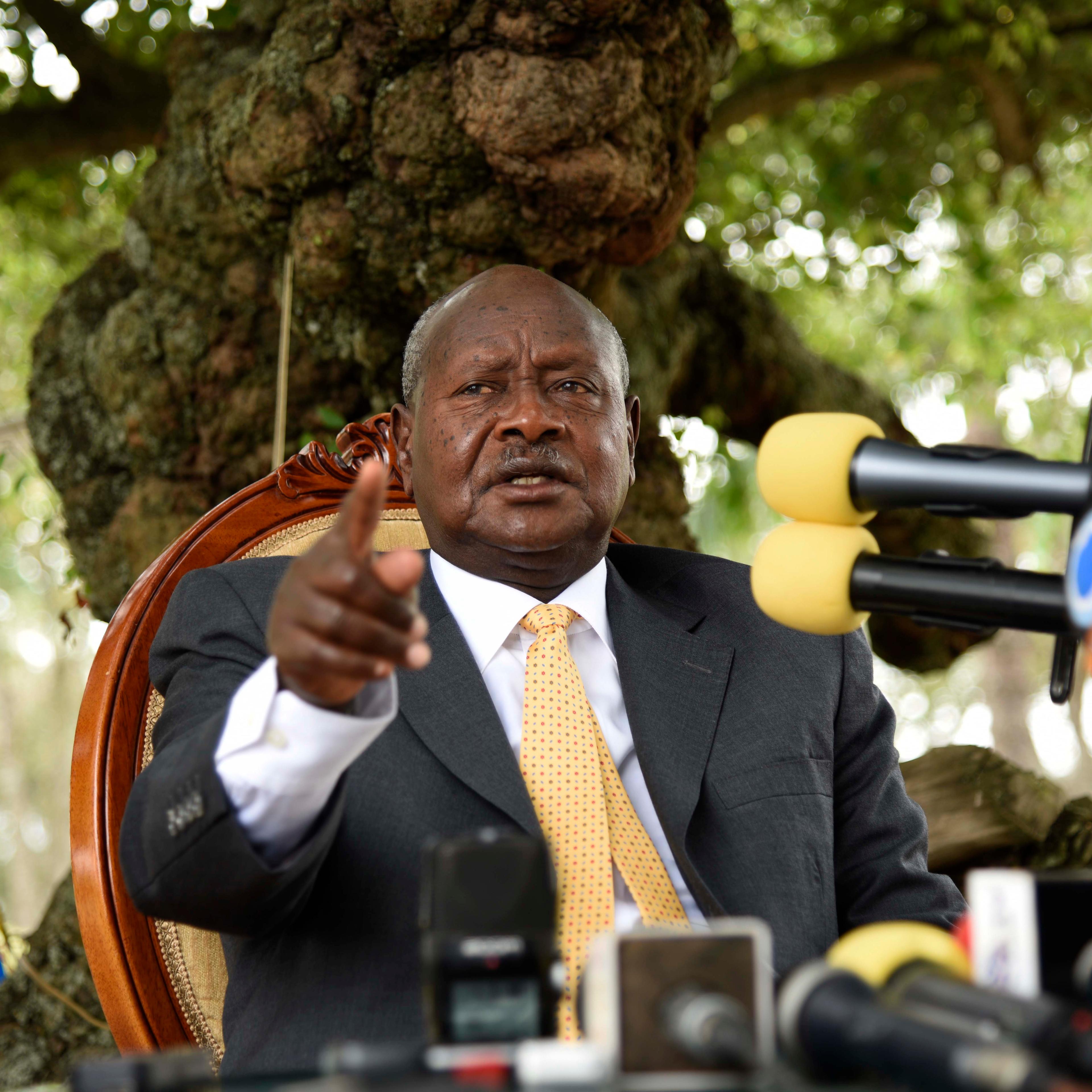 Newly re-elected president Yoweri Museveni, in power since three decades, gestures as he speaks during a press conference at his country house in Rwakitura on Feb. 21, 2016.