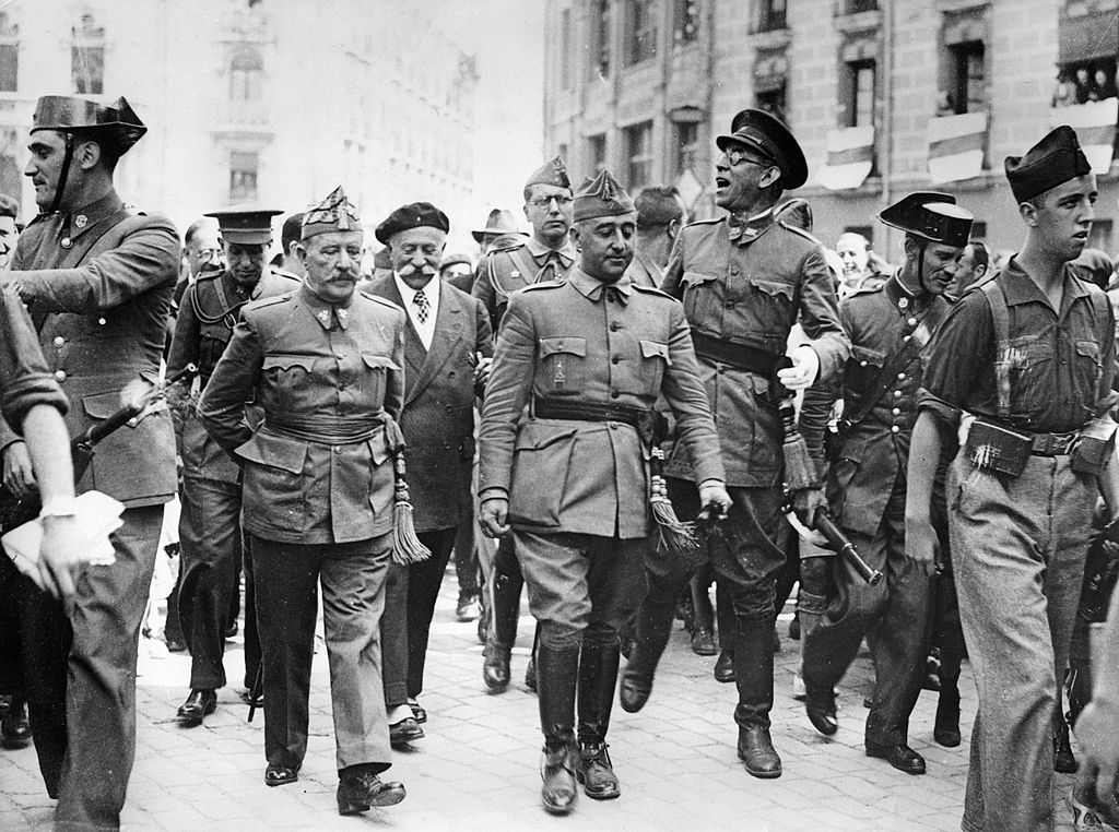 General Francisco Franco, commander in the south, is visiting the headquater of the Northern Front in Burgos. F.l.t.r.: General Cavalcanti, General Francisco Franco Bahamonde and the Nationalist commander in the north General Emilio Mola Vidal (with glas