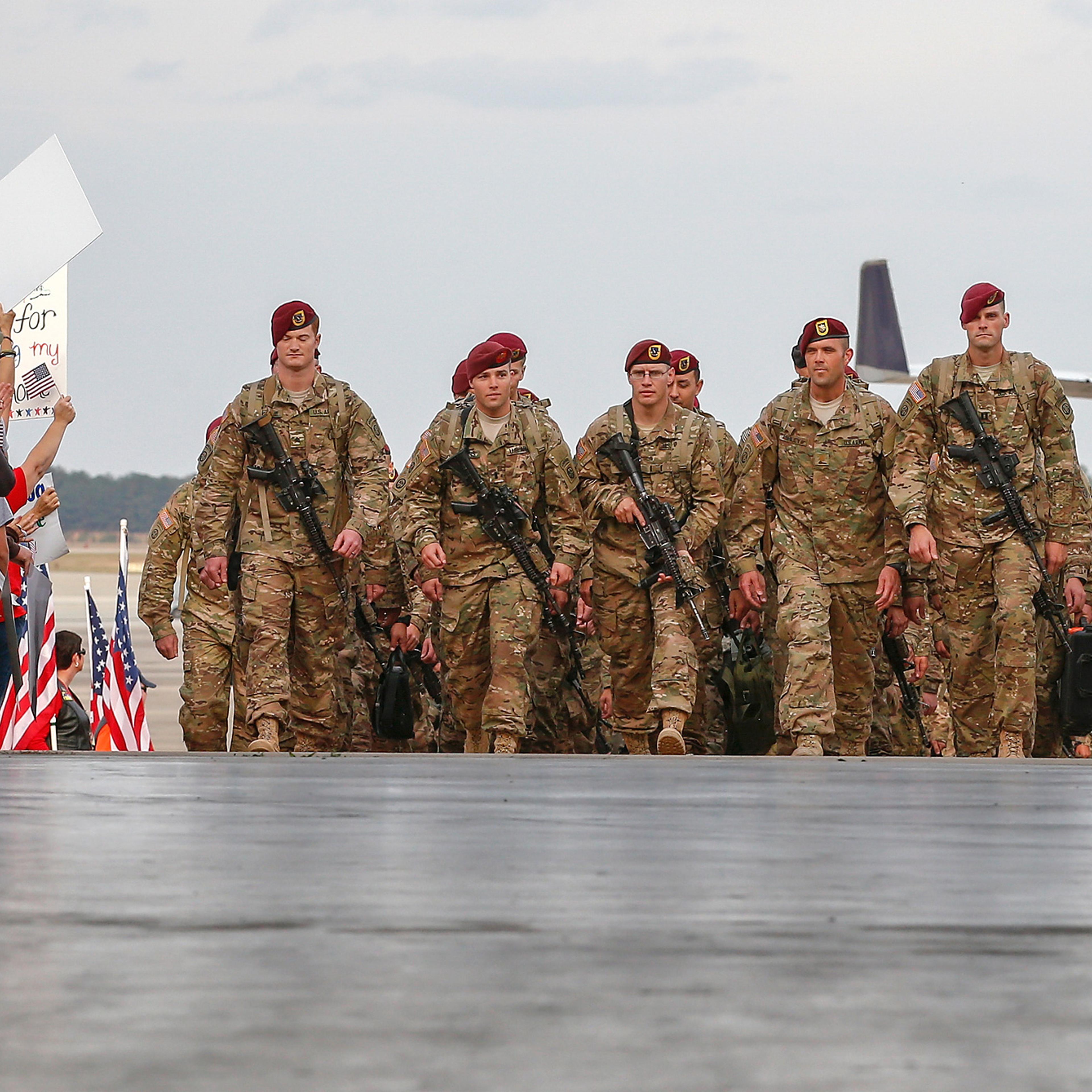 Paratroopers march up the ramp as they return home from Afghanistan at Pope Army Airfield in Fort Bragg, North Carolina