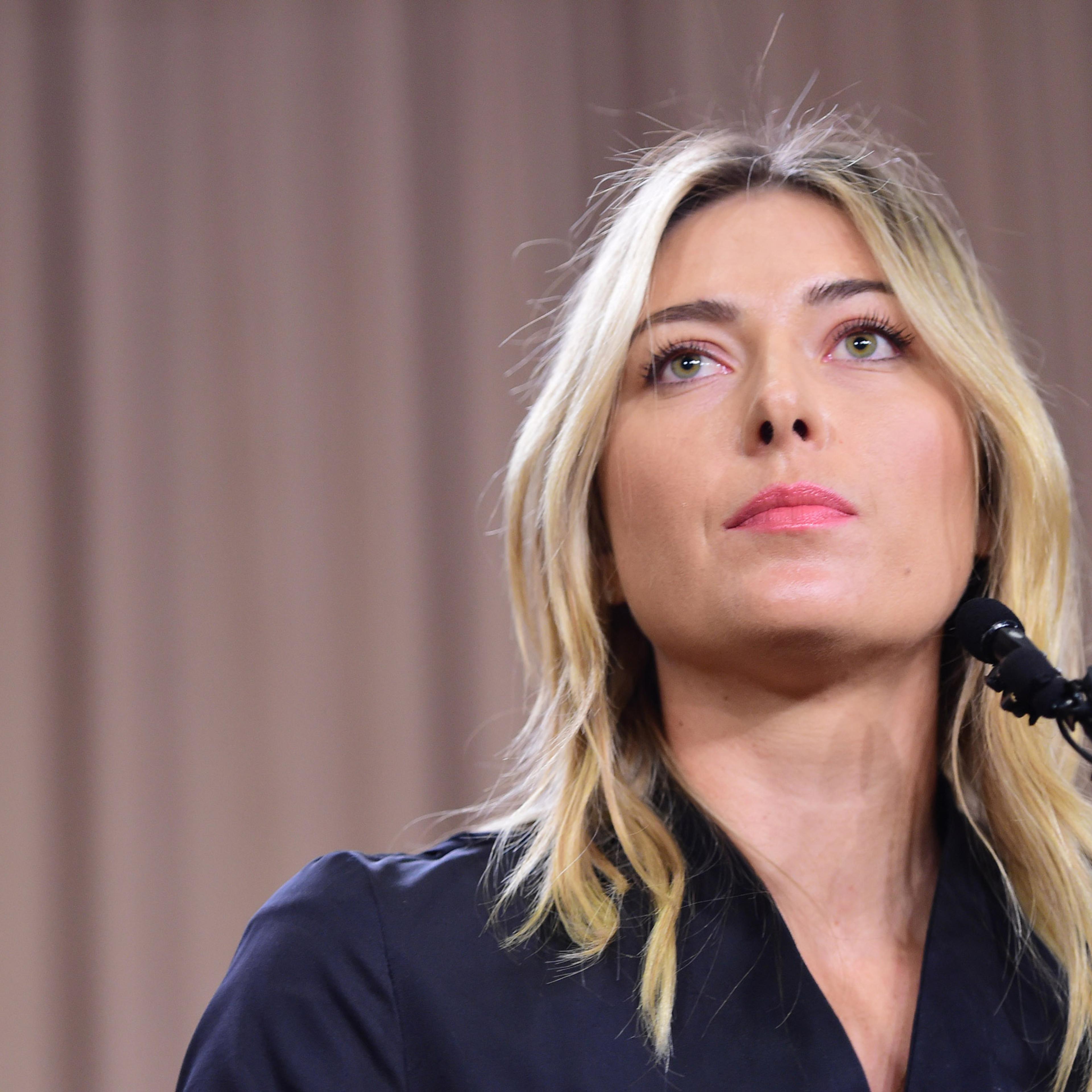 Russian tennis player Maria Sharapova speaks at a press conference in downtown Los Angeles, California, March 7, 2016. / AFP / Robyn Beck (Photo credit should read ROBYN BECK/AFP/Getty Images)