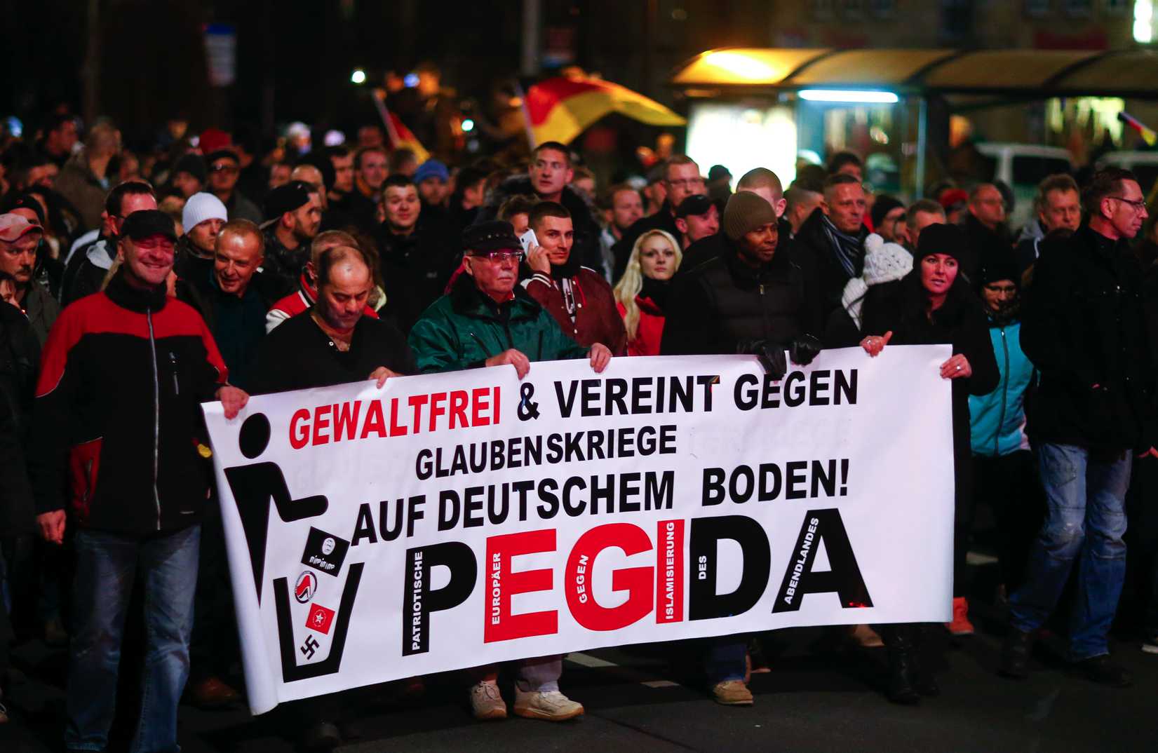 Participants hold a banner during a demonstration called by anti-immigration group Patriotic Europeans Against the Islamization of the West (Pegida) in Dresden, Germany, on Dec. 15, 2014 