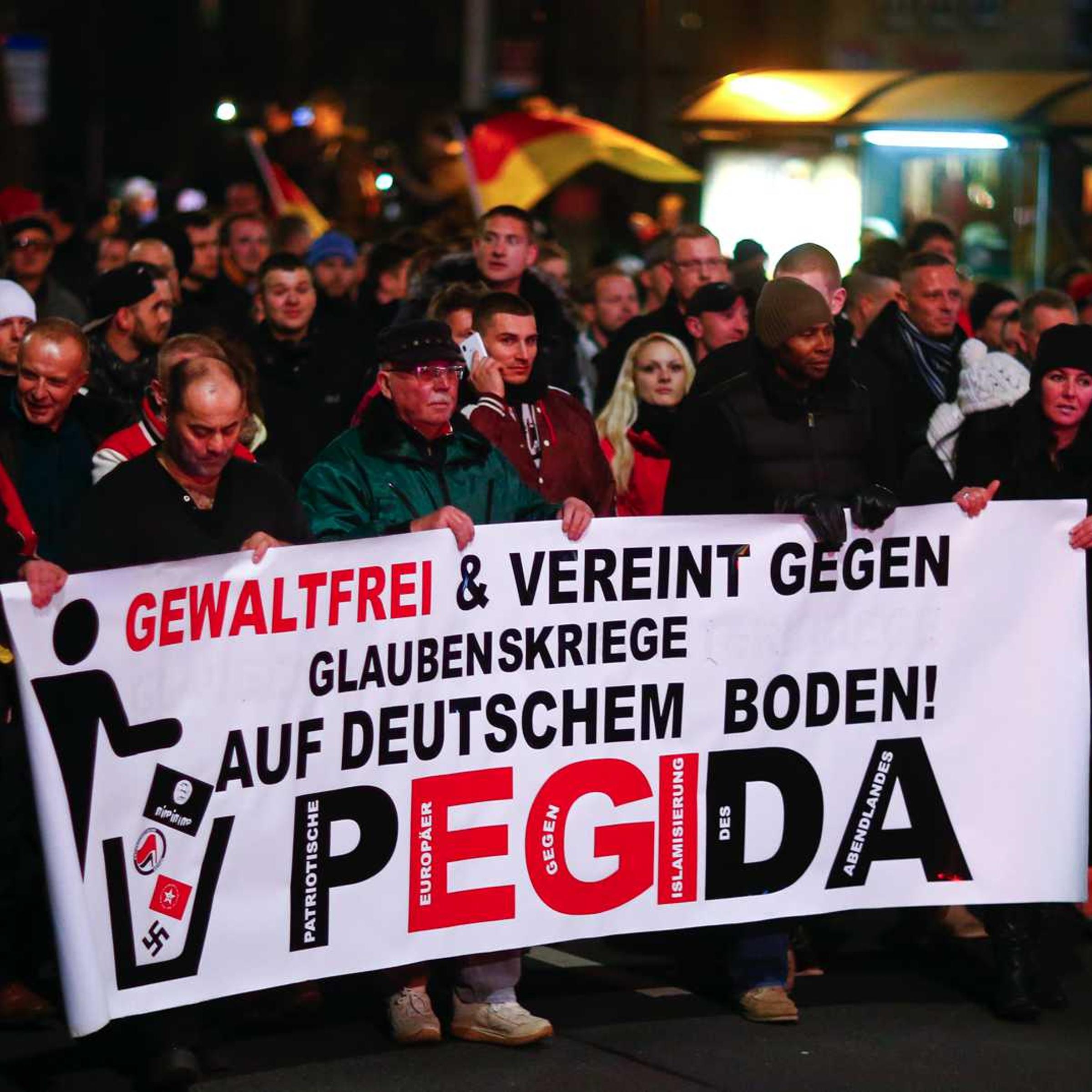 Participants hold a banner during a demonstration called by anti-immigration group Patriotic Europeans Against the Islamization of the West (Pegida) in Dresden, Germany, on Dec. 15, 2014