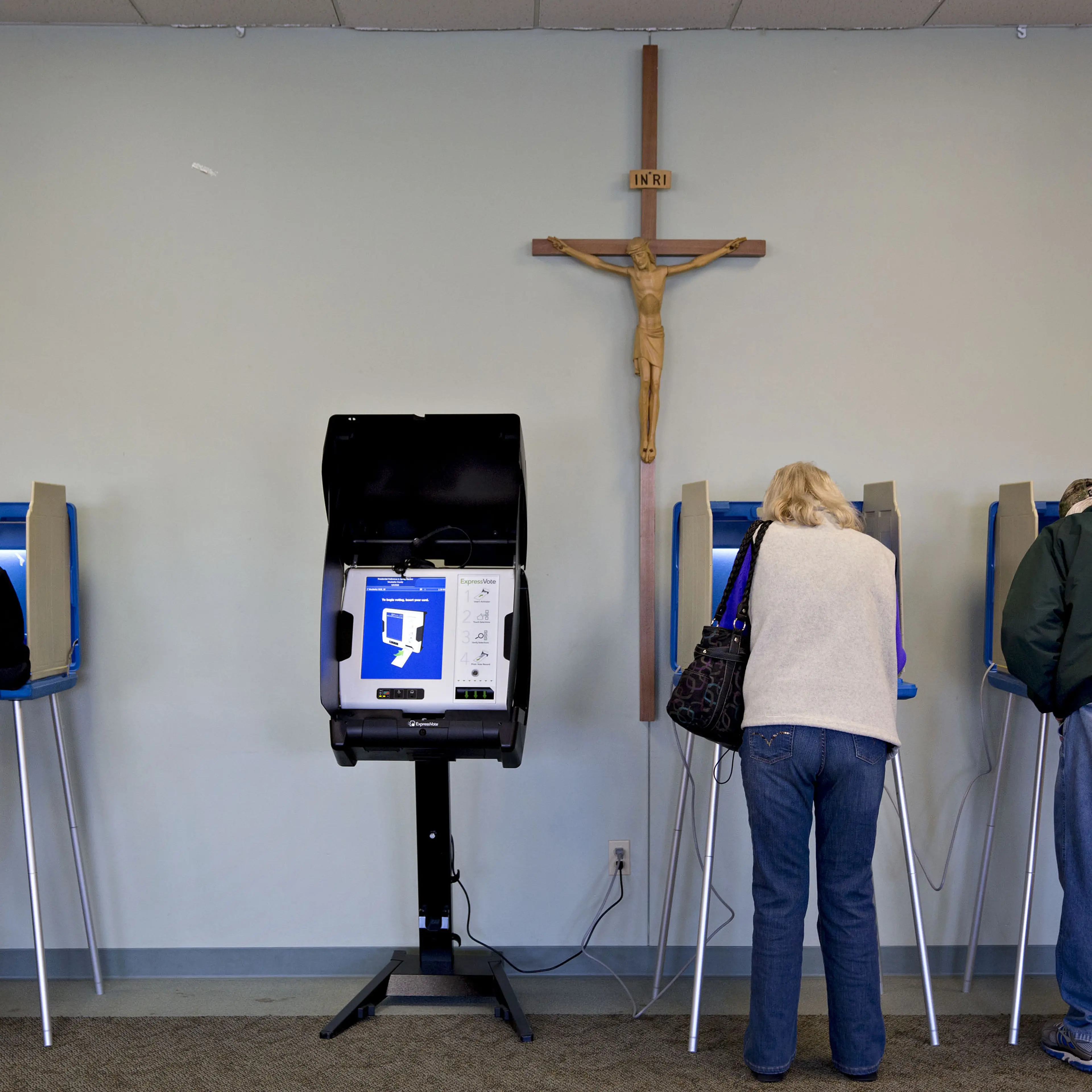 Residents fill out ballots at a polling location during the presidential primary vote in Waukesha, Wis. on April 5, 2016.