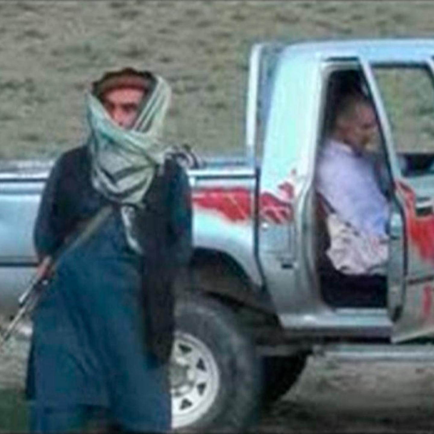 U.S. Army Sergeant Bowe Bergdahl waits in a pick-up truck before he is freed at the Afghan border