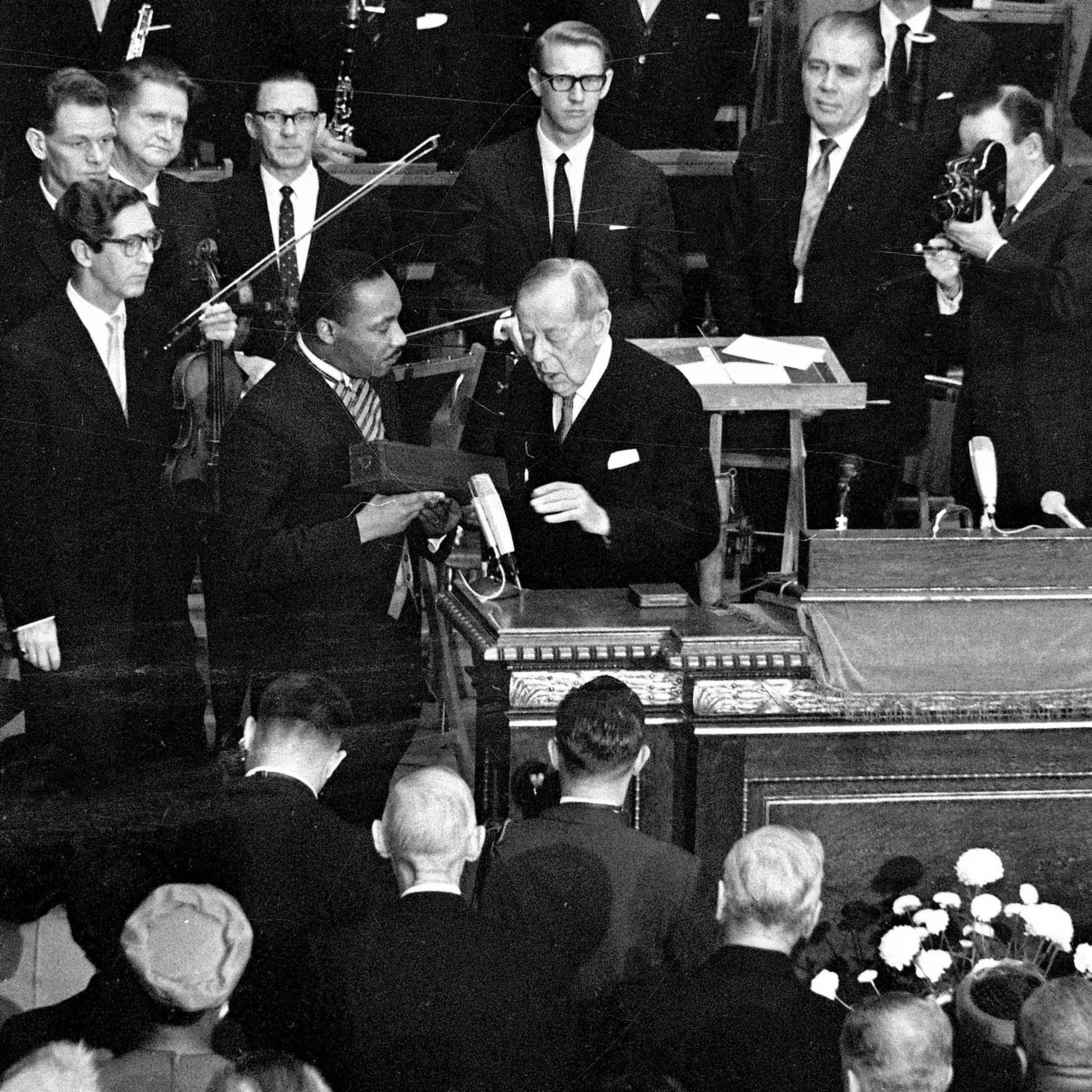 In this Dec. 10, 1964, file photo, U.S. civil rights leader Rev. Dr. Martin Luther King receives the Nobel Peace Prize from Gunnar Jahn, chairman of the Nobel Committee, in Oslo, Norway. (AP Photo, File)