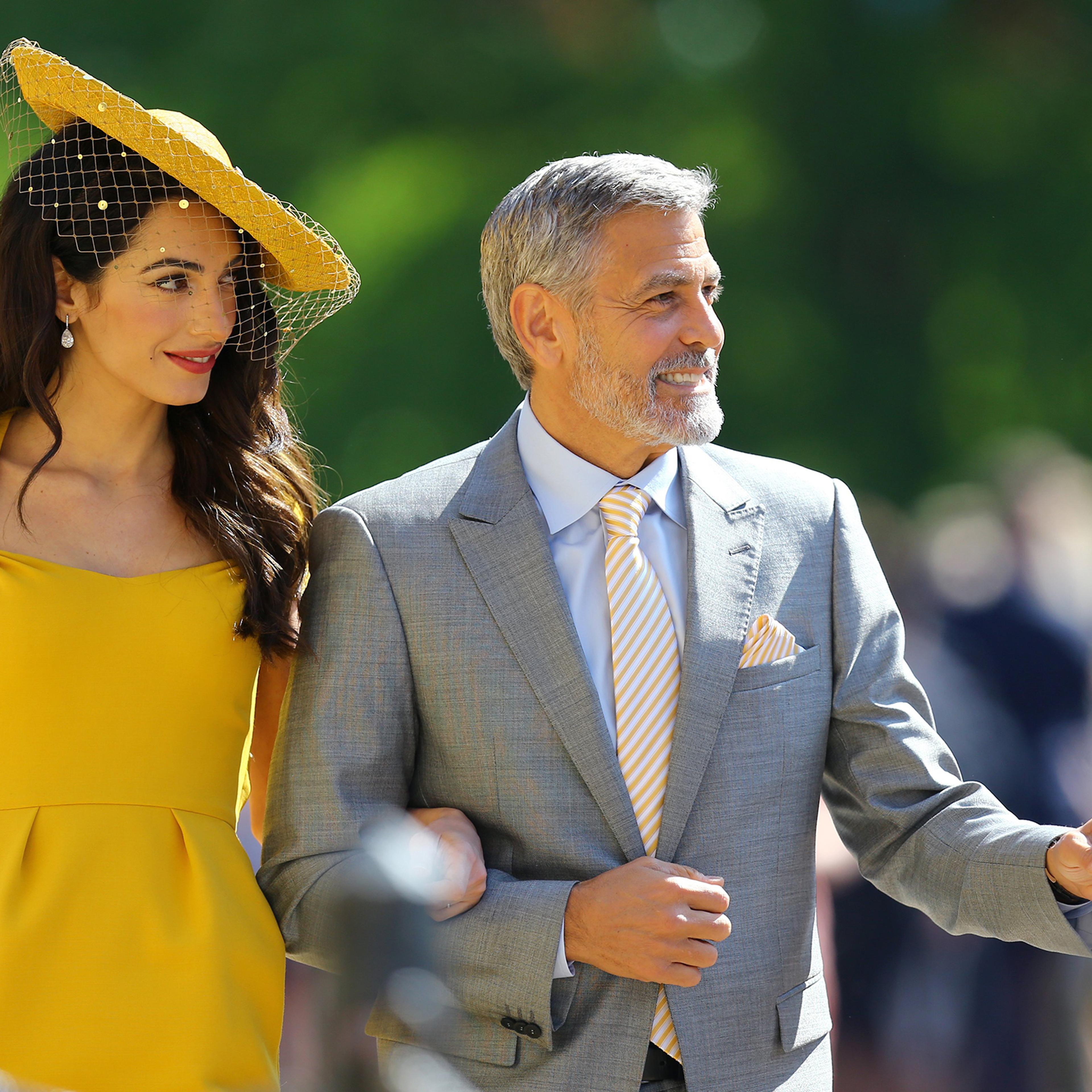 Amal Clooney and George Clooney arrive at St George's Chapel at Windsor Castle for the wedding of Meghan Markle and Prince Harry, May 19, 2018.